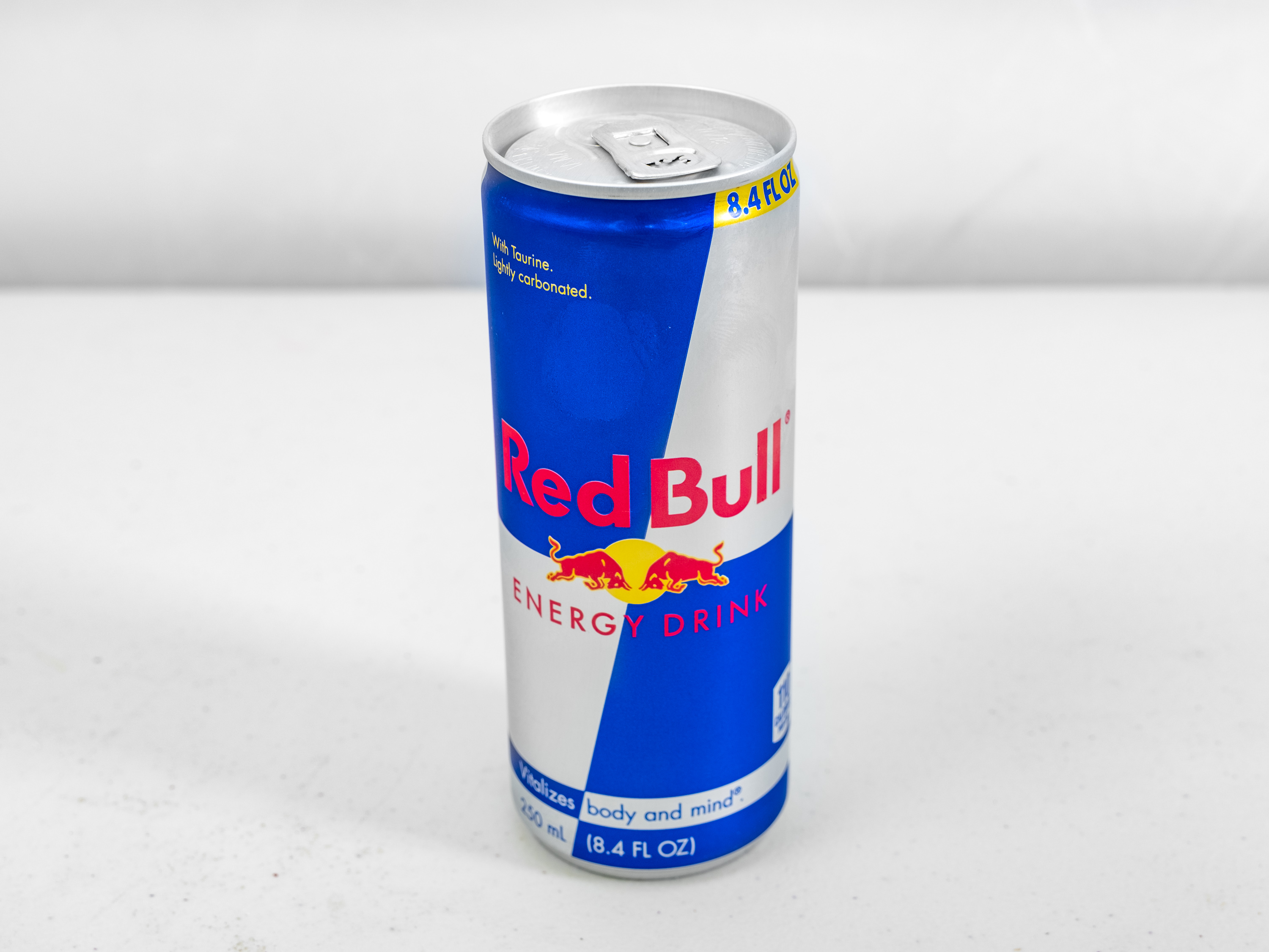 Order Red Bull 8.4oz food online from Circle K And Liquors store, Fontana on bringmethat.com