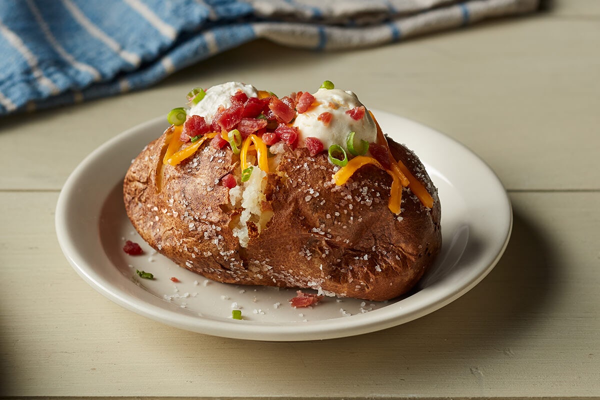 Order Loaded Baked Potato food online from Cracker Barrel store, Rochester on bringmethat.com