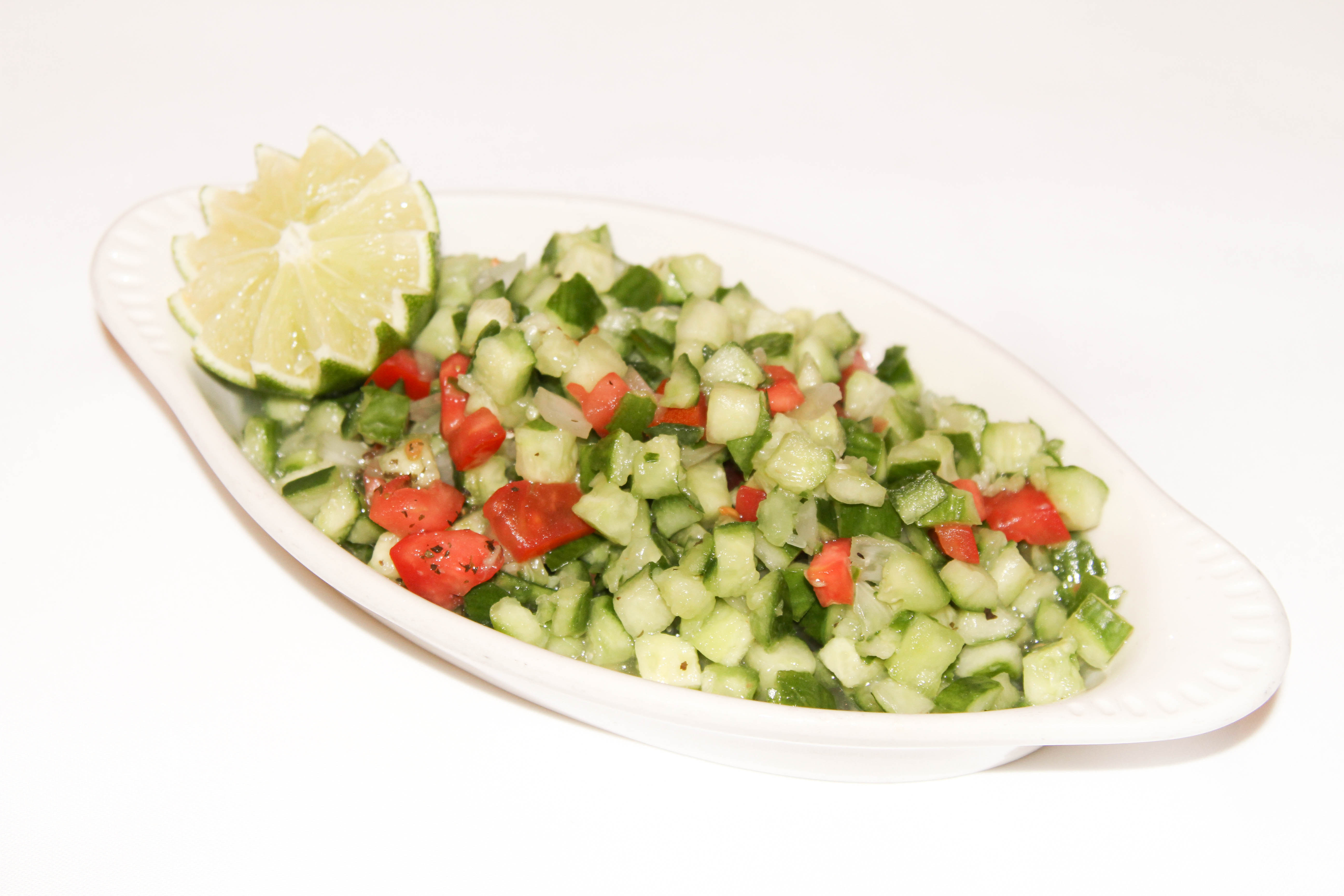 Order Shirazi Salad food online from Shaherzad Restaurant store, Los Angeles on bringmethat.com