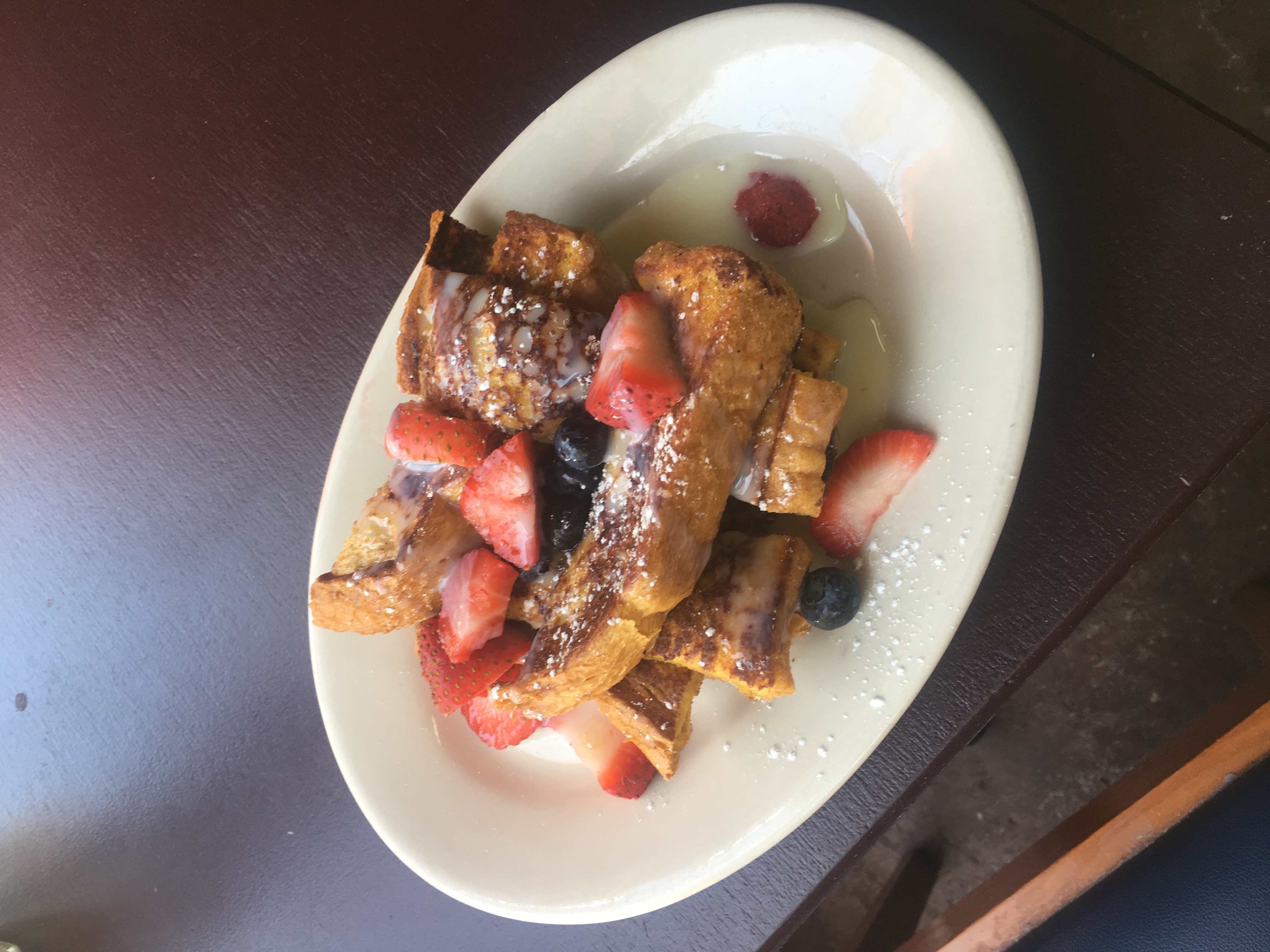 Order Ricotta and Strawberries French Toast food online from Street Level Cafe store, Los Angeles on bringmethat.com