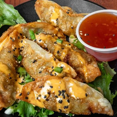 Spicy Pork Dumpling from Green's Grill & Sushi Bar
