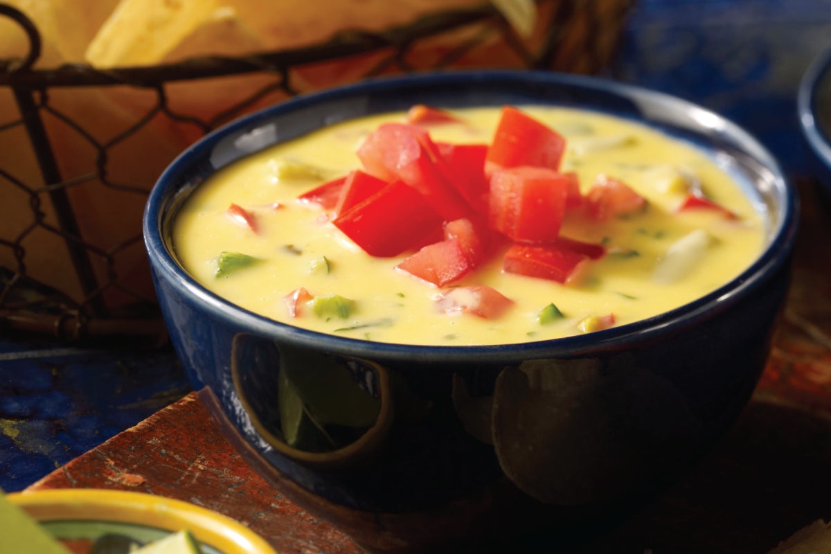 Order Chile Con Queso food online from Uncle Julio's store, Brentwood on bringmethat.com