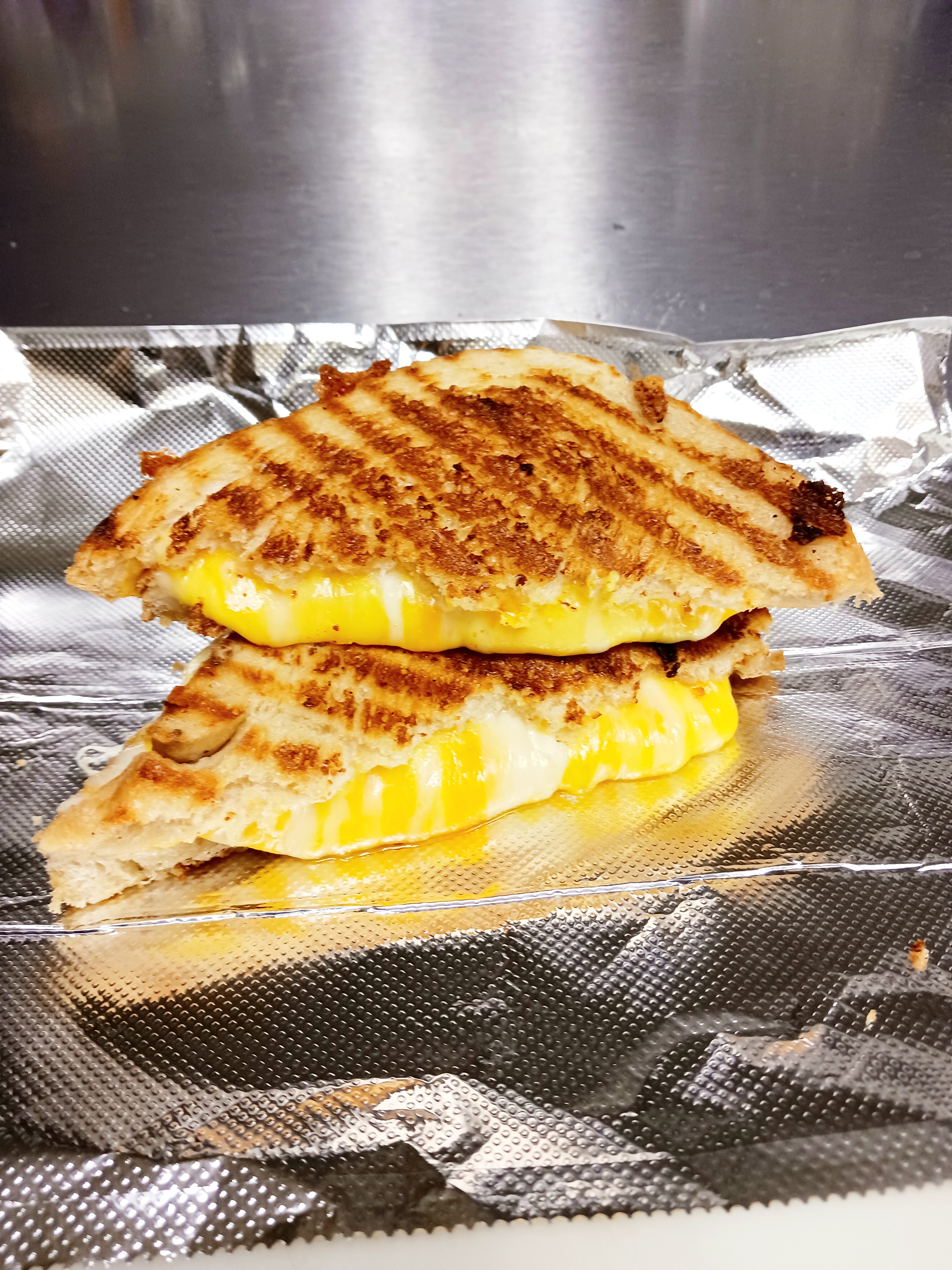 Order TRIPLE X MELT food online from The Grilled Cheese Factory store, Rochester on bringmethat.com