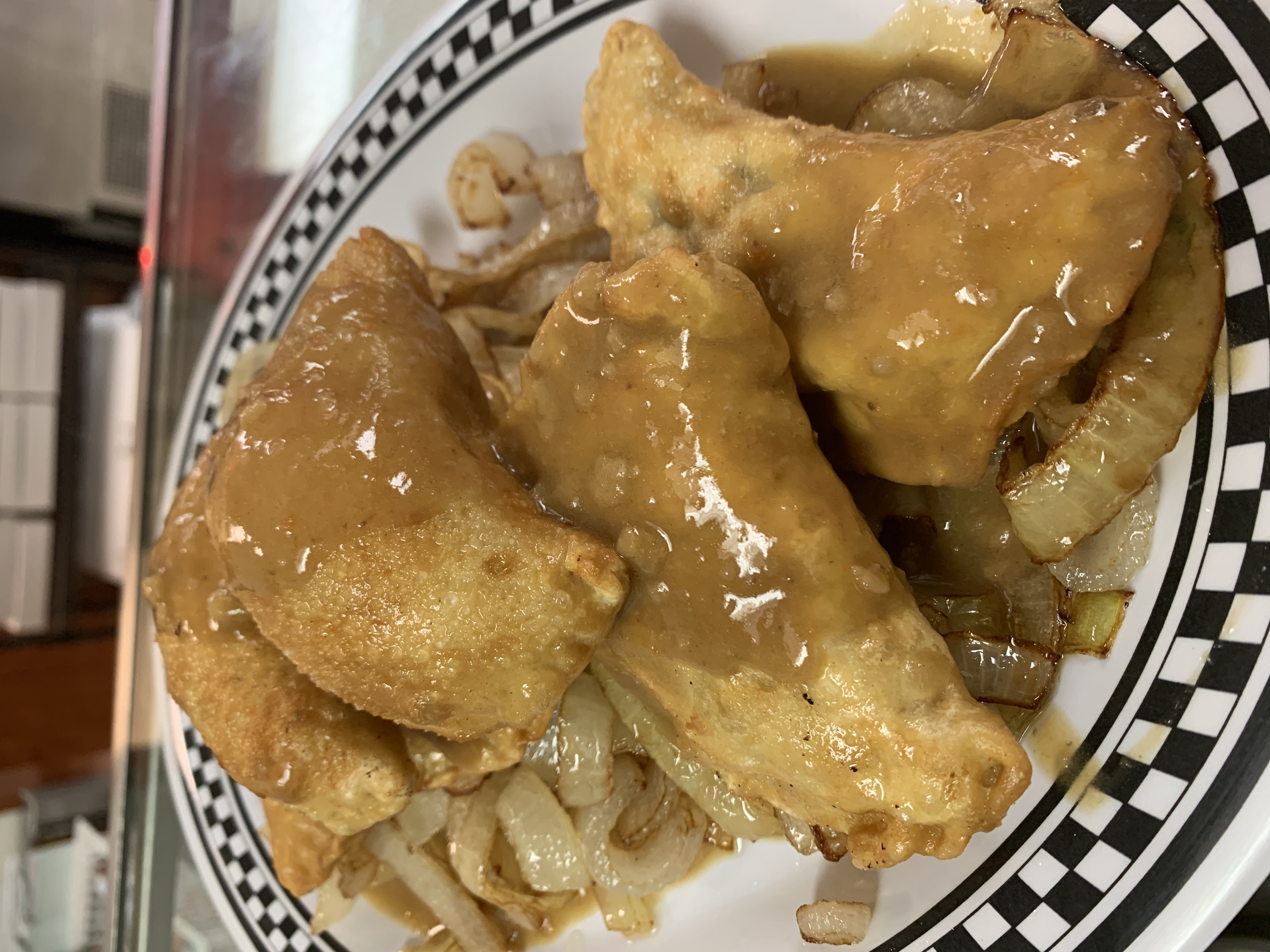 Order Fried Kreplach with Fried Onions food online from The Kibitz Room store, Cherry Hill on bringmethat.com