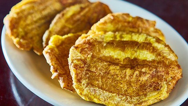 Order Tostones food online from Riko Peruvian Cuisine store, Queens on bringmethat.com