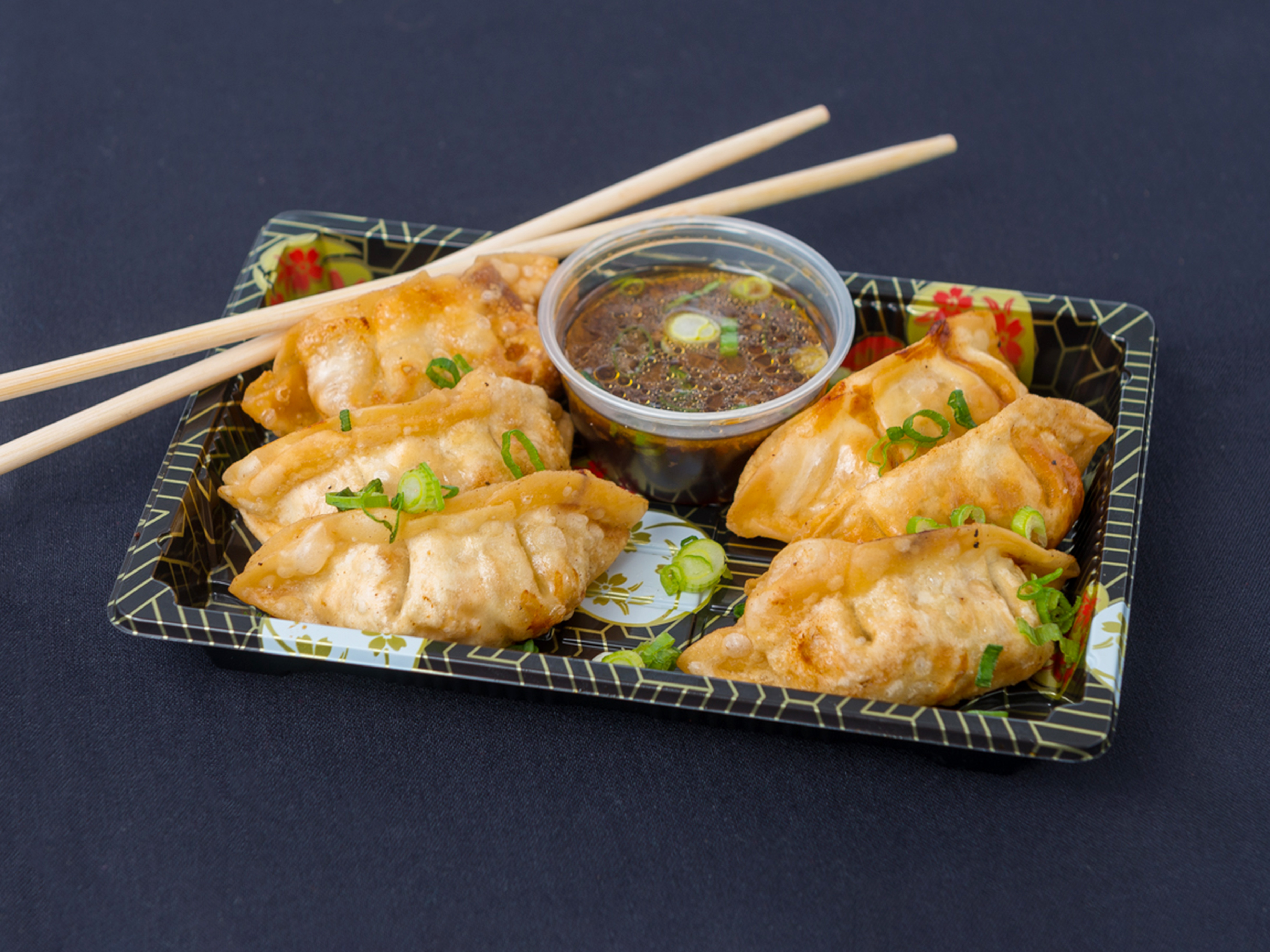Order Fried Chicken Gyoza Dumplings  ( 6) food online from Wok N Kebab Asian Street Fare store, Oviedo on bringmethat.com