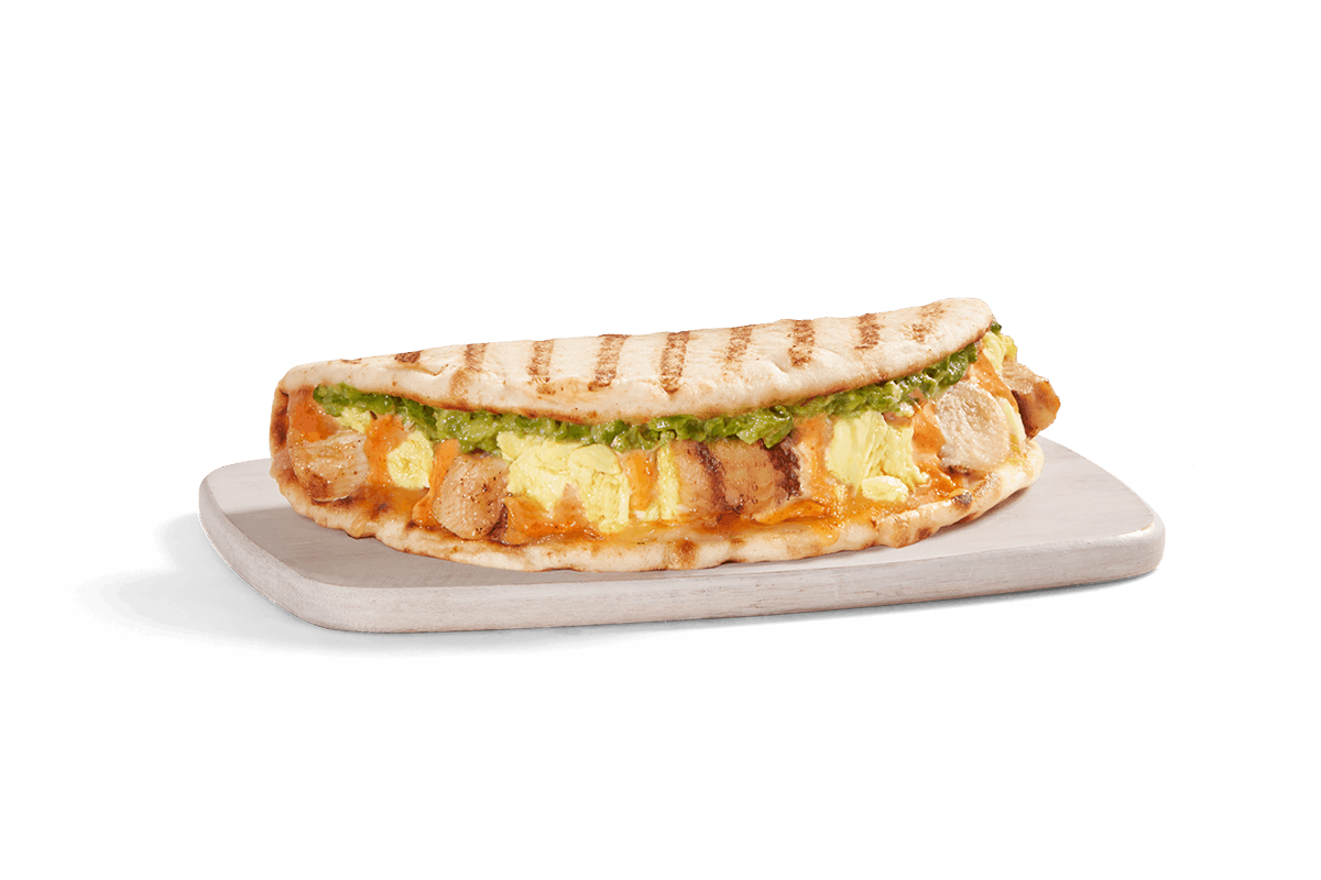 Order NEW! CALI BREAKFAST FLATBREAD food online from Tropical Smoothie Cafe store, Bay Shore on bringmethat.com