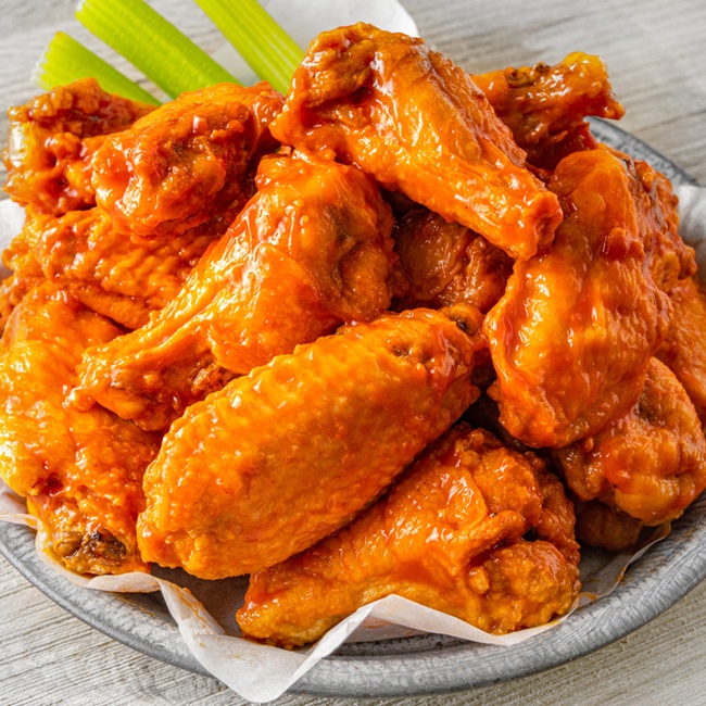 Order 20 Wings food online from Hurricane Grill & Wings store, Syosset on bringmethat.com