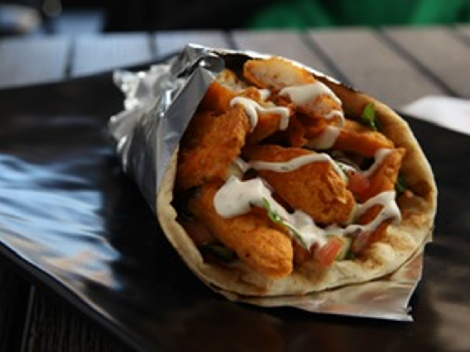 Order Fried Fish Gyro food online from Halal Munchies store, Queens on bringmethat.com