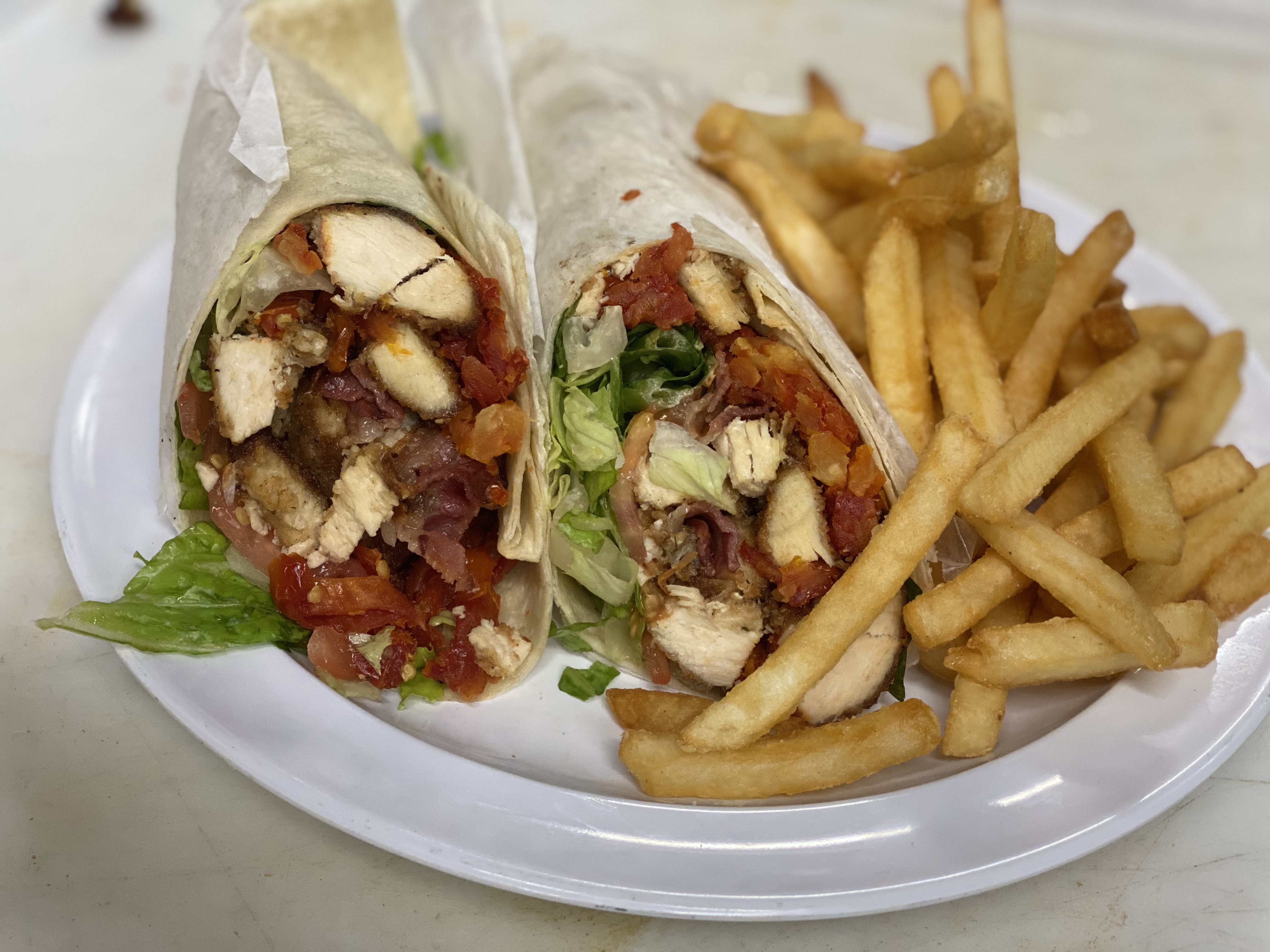 Order The boss Wrap food online from Vernon Grill store, Vernon on bringmethat.com