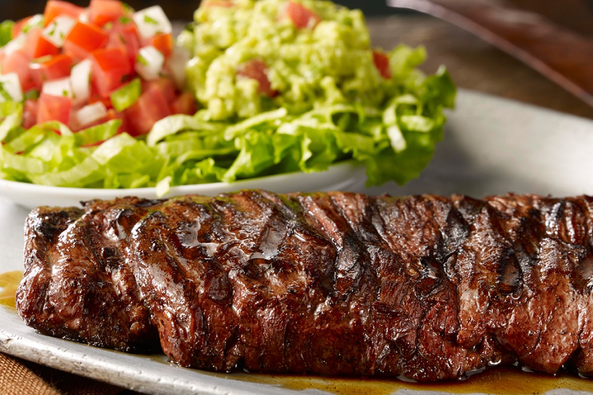 Order Carne Asada food online from Uncle Julio's store, Brentwood on bringmethat.com