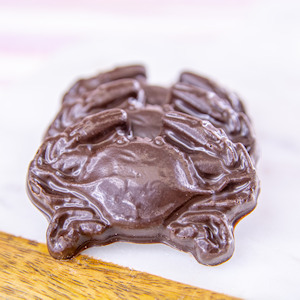 Order Dark Chocolate Crabs, 4 pc. Bag food online from Wockenfuss Candies store, Columbia on bringmethat.com