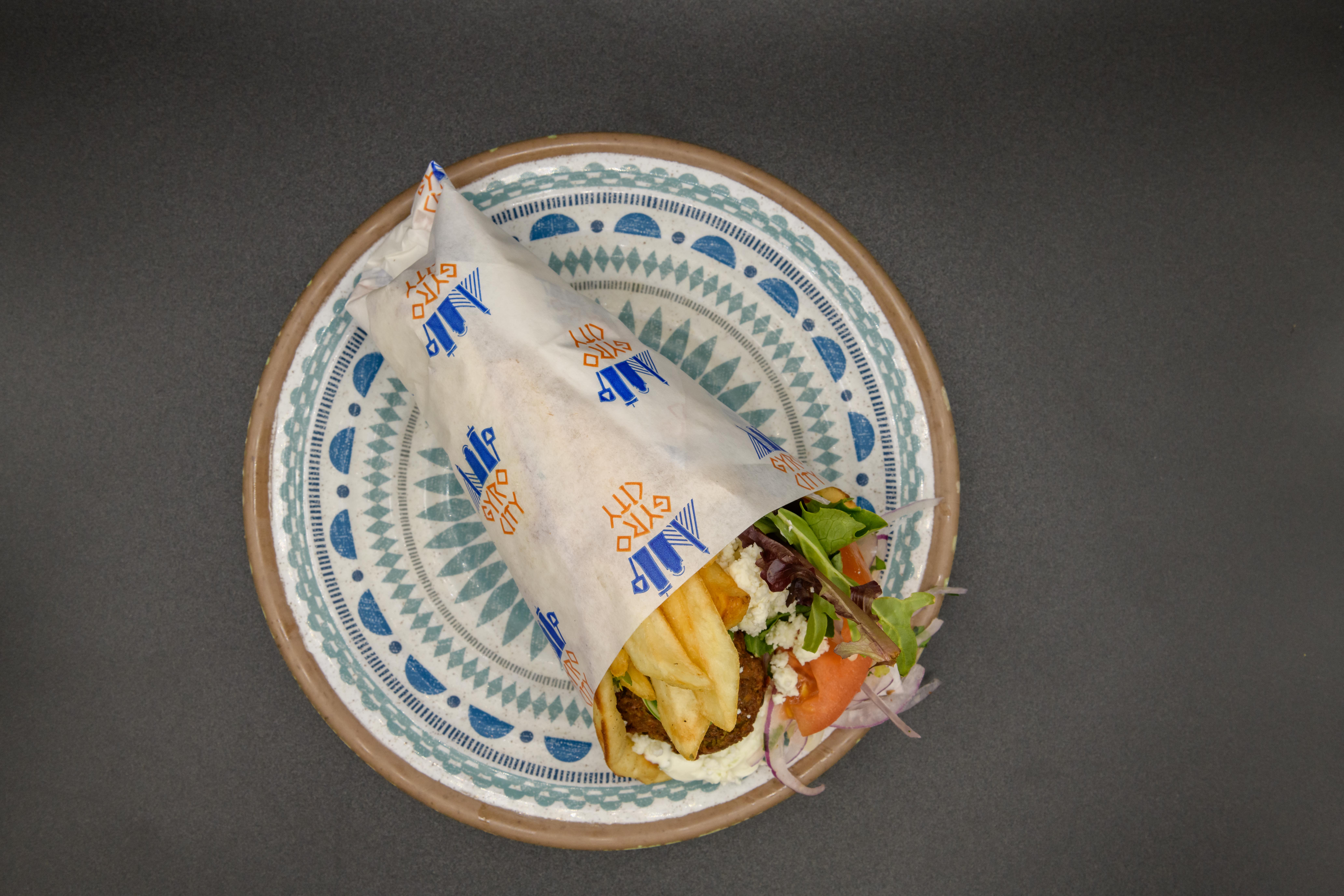 Order Bifteki Pita food online from Gyro City store, Brighton on bringmethat.com