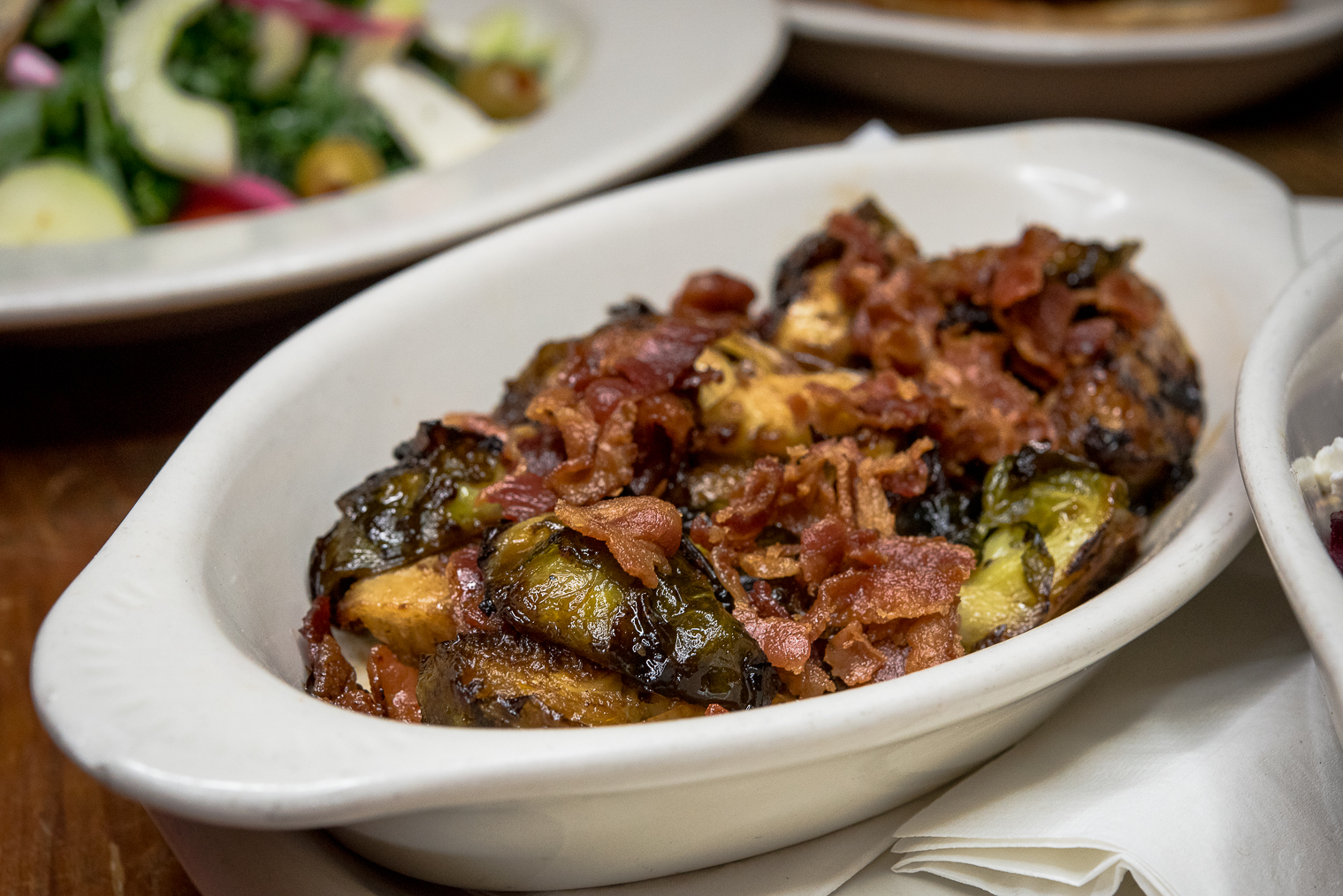 Order Caramelized Brussels Sprouts food online from Le Cheile store, Manhattan on bringmethat.com