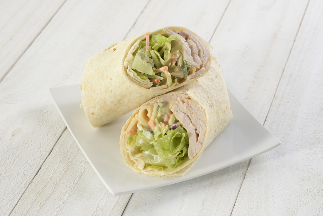 Order Turkey, Swiss and Slaw Wrap food online from Nature's Table - 2nd Ave S store, St. petersburg on bringmethat.com