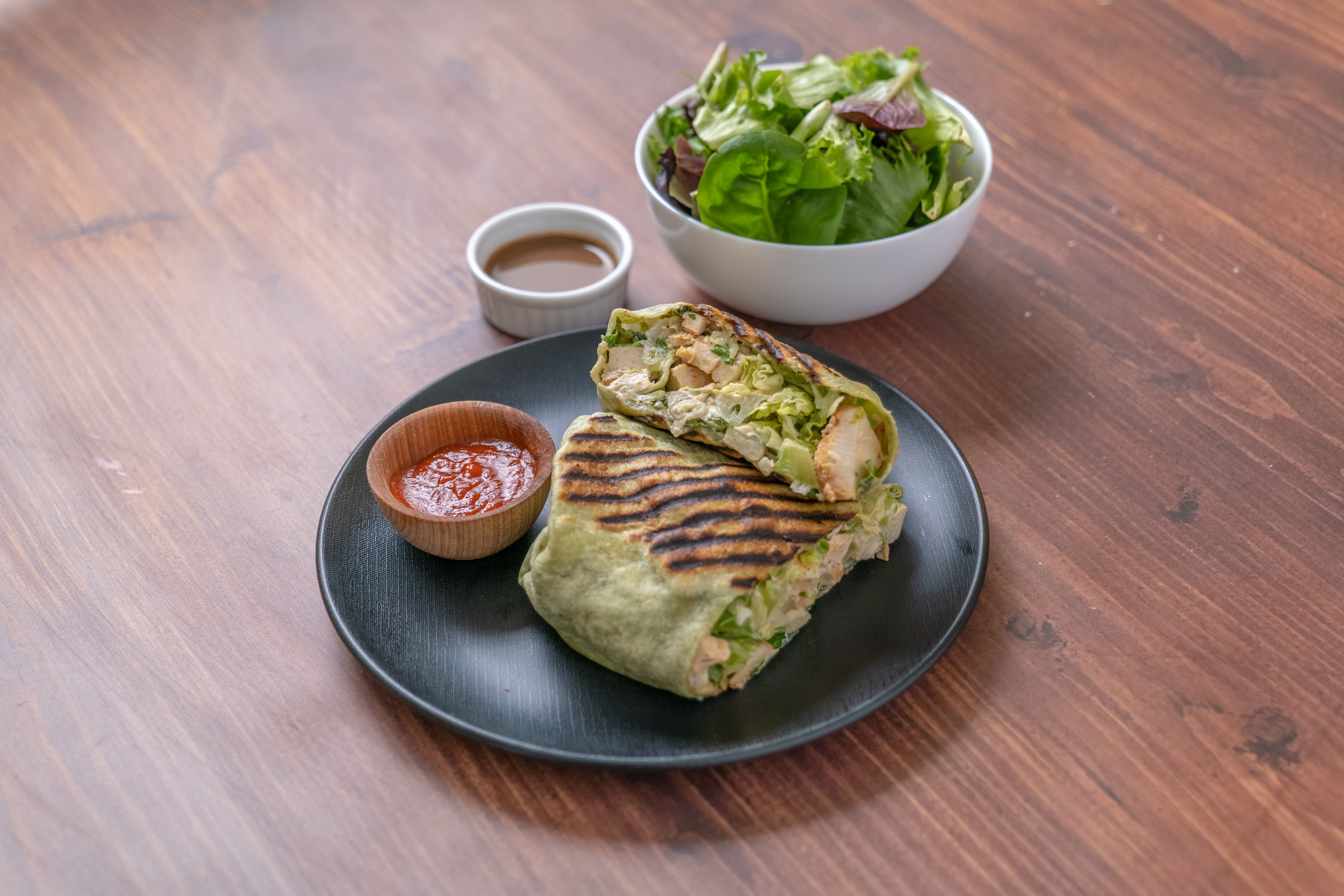 Order Chicken Avocado Caesar Wrap food online from Vienna Cafe store, Los Angeles on bringmethat.com