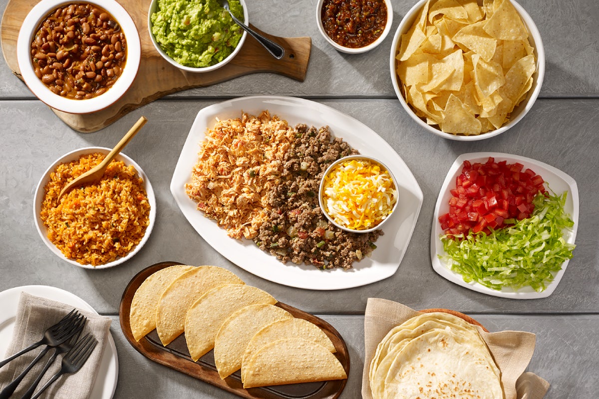Order Family Taco Meal for 4 food online from Uncle Julio's store, Brentwood on bringmethat.com
