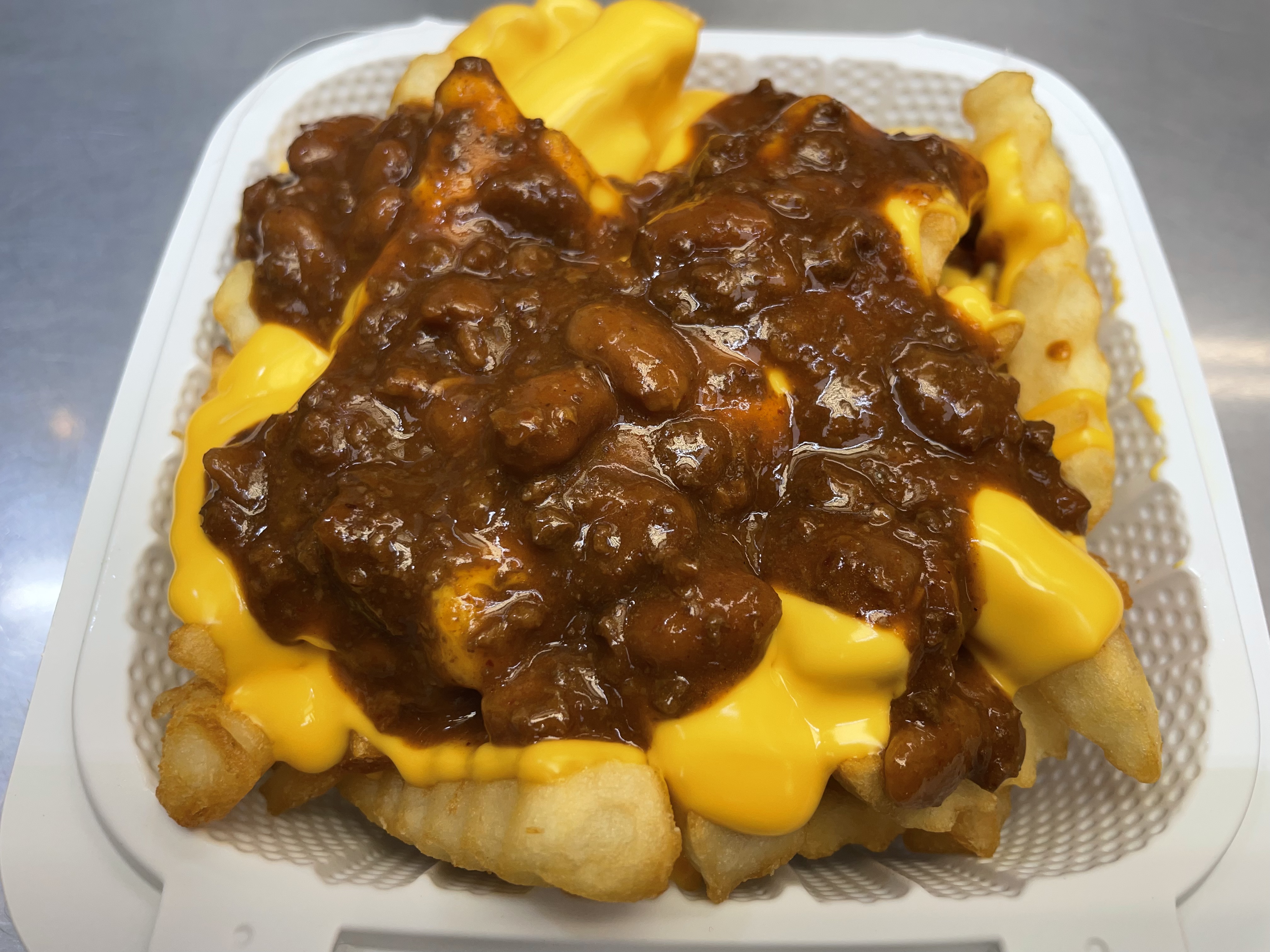 Order Chili Cheese Fries food online from Atlantic Fish N Chips store, New York on bringmethat.com