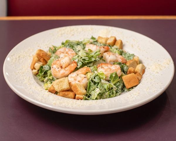 Order Caesar Salad food online from 4 Brothers Italian Restaurant & Pizzeria store, Delray on bringmethat.com