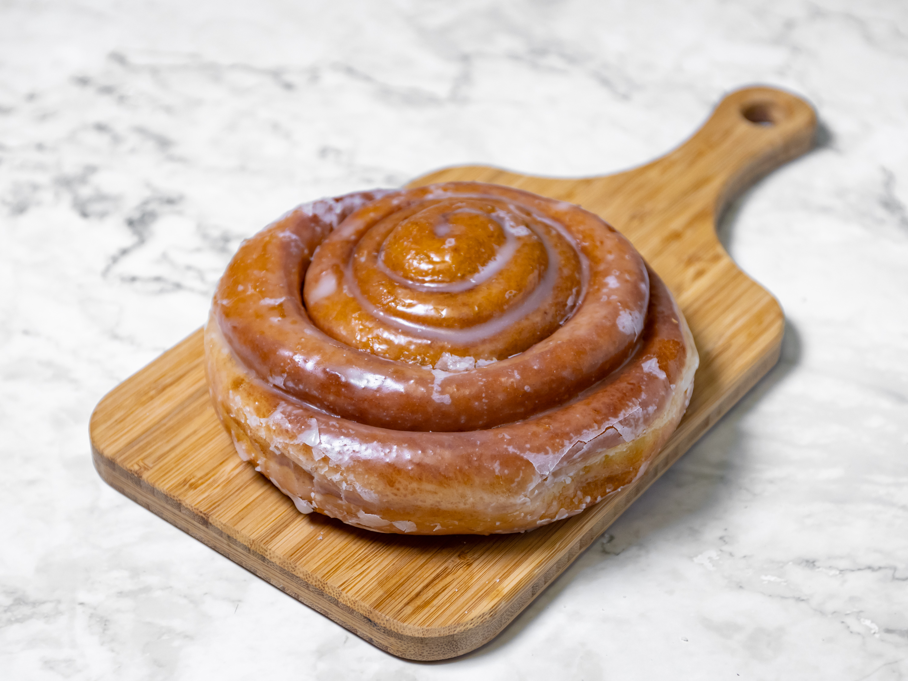 Order Cinnamon Roll  Donut food online from Master Donuts store, Fontana on bringmethat.com