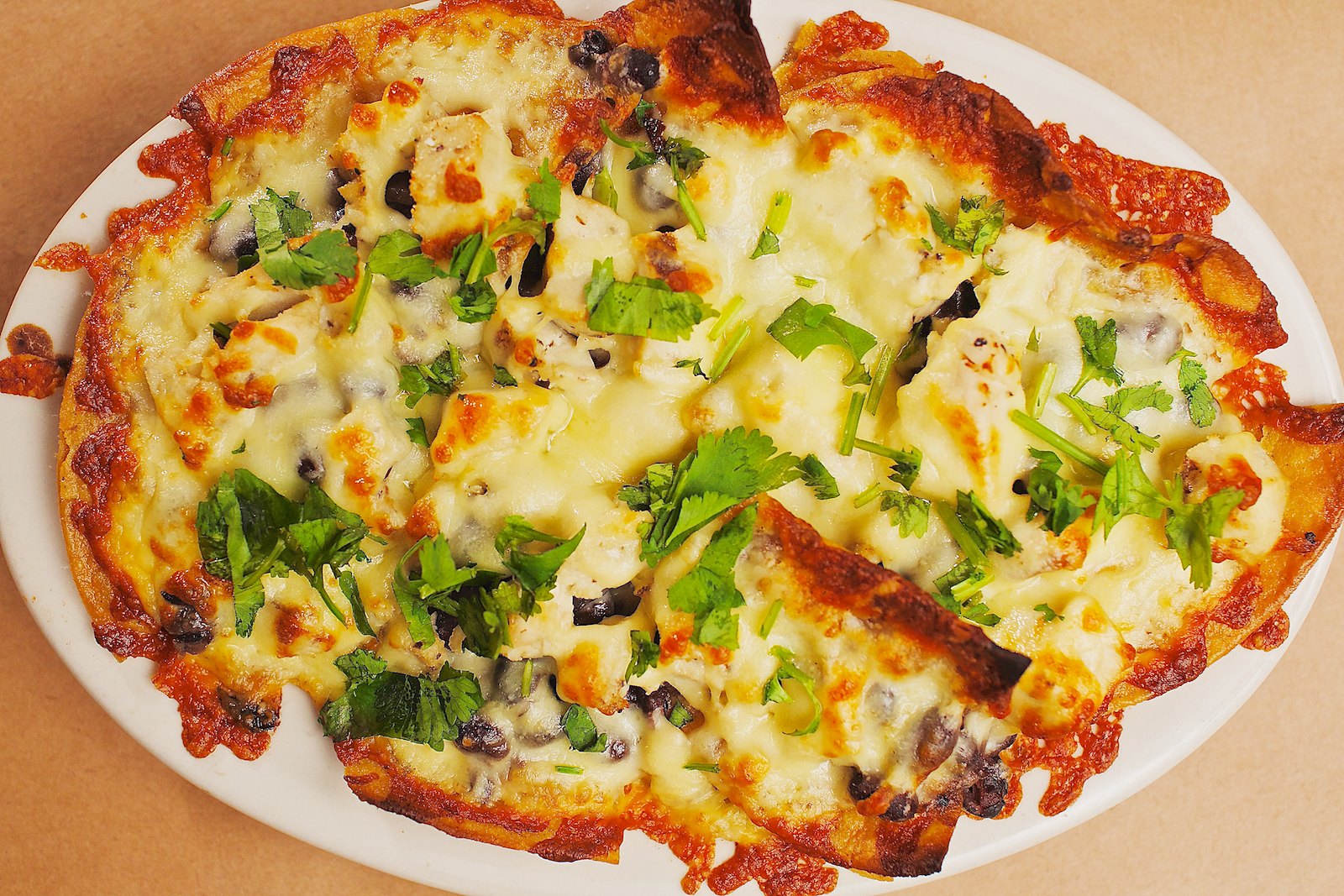 Order Nachos Azteca food online from La Cucaracha Mexican Restaurante store, Saint Paul on bringmethat.com