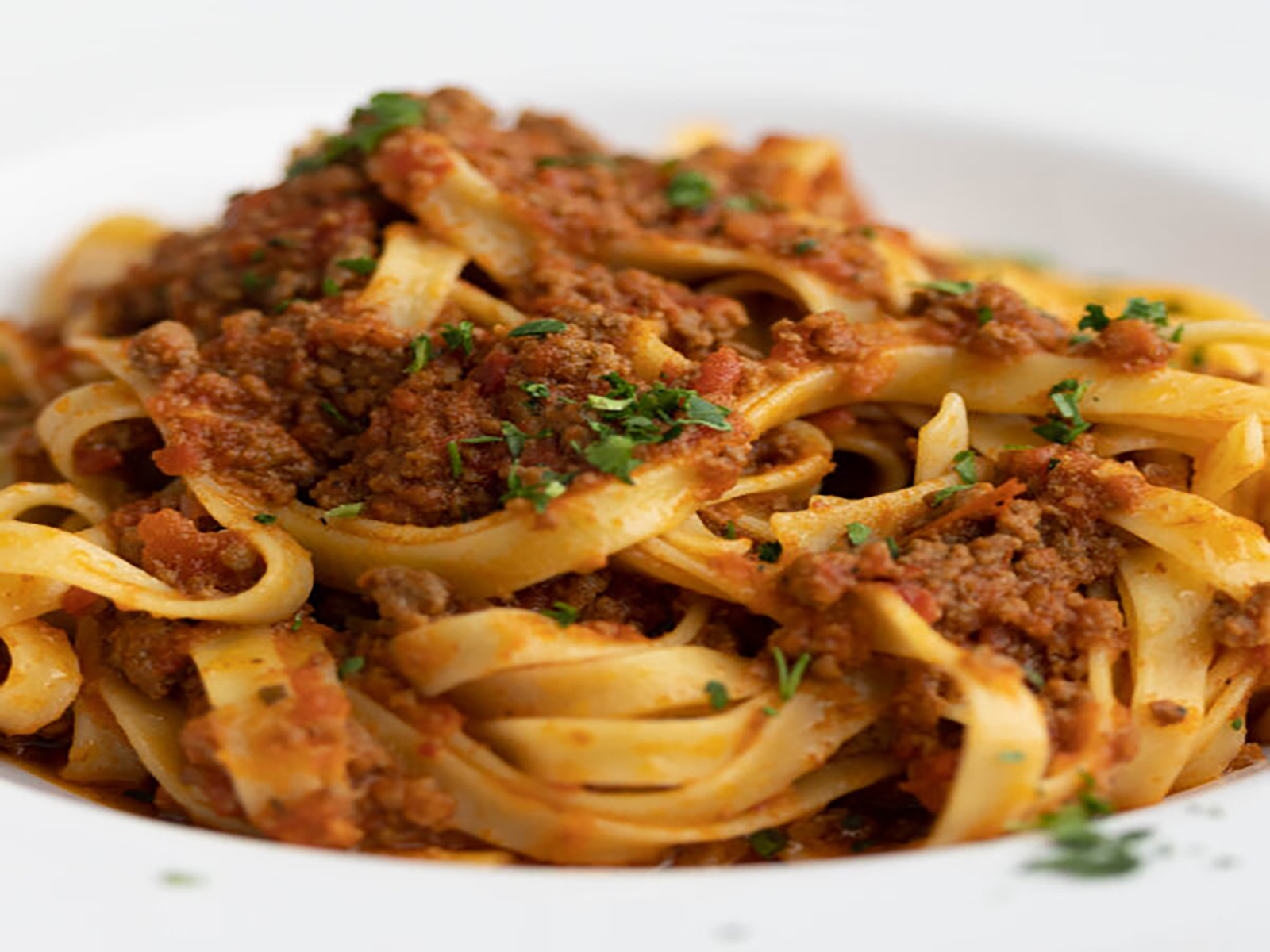Order Pasta Bolognese food online from Buccaneer Pizza store, Santa Ana on bringmethat.com