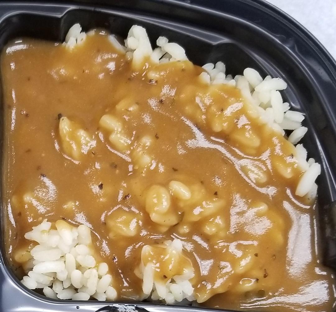 Order Rice and Gravy food online from Tan Finger Lickin Chicken store, Philadelphia on bringmethat.com
