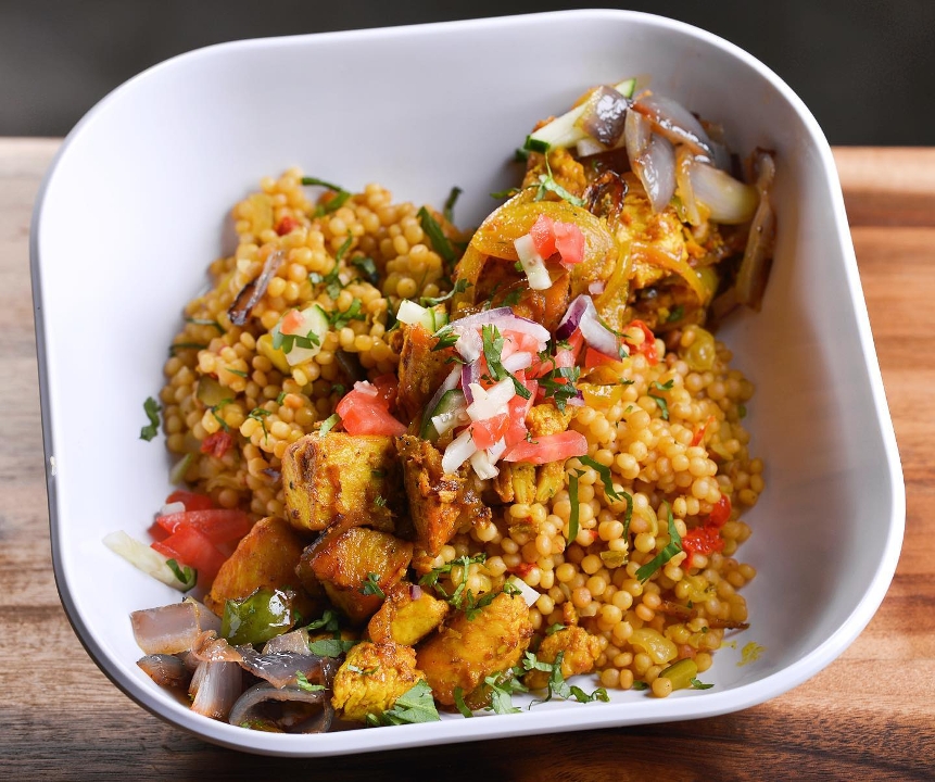 Order Yassa Chicken Rice Bowl food online from Afro Deli store, Saint Paul on bringmethat.com