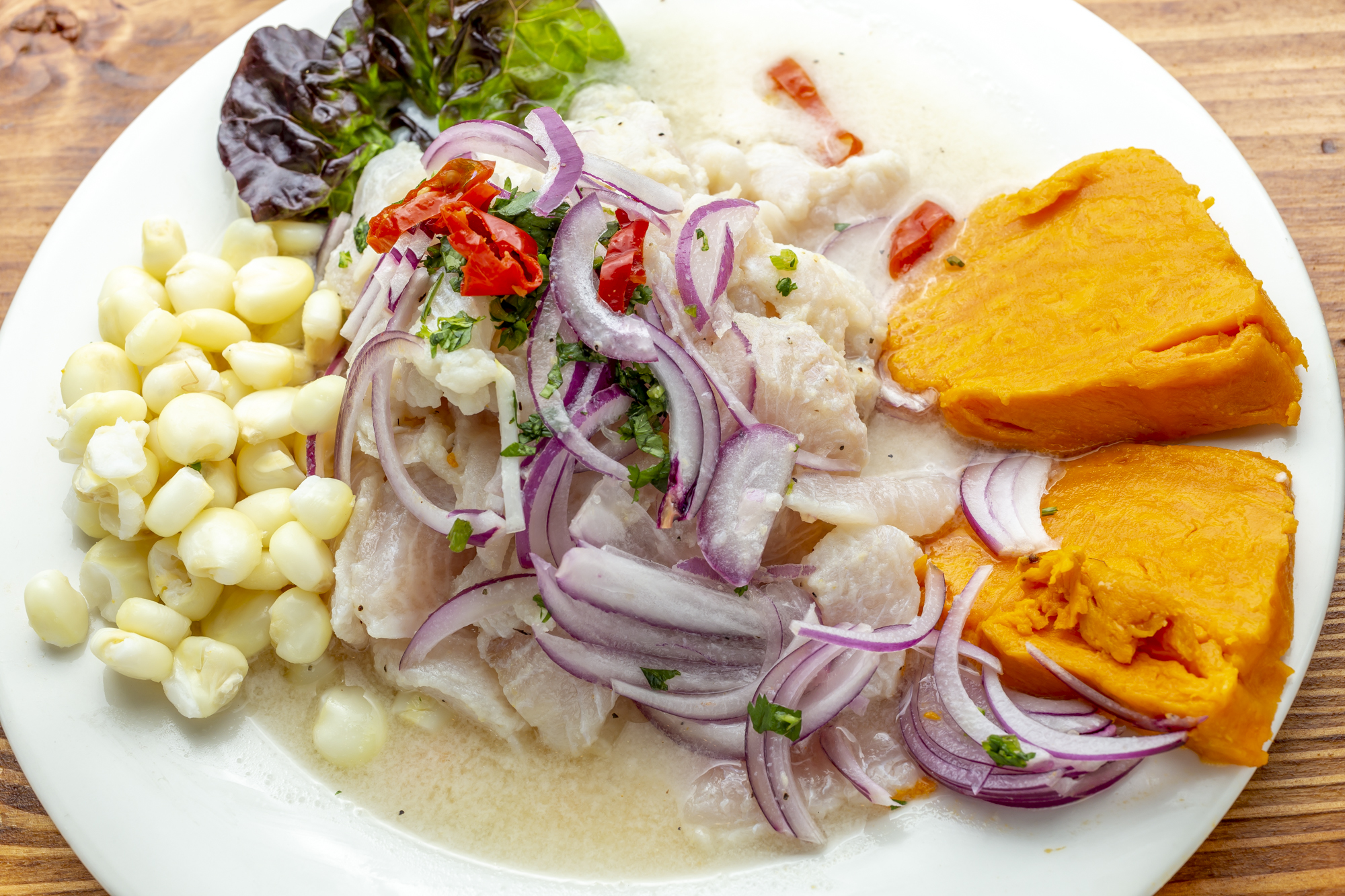 Order Ceviche de Pescado food online from Riko Peruvian Cuisine store, Queens on bringmethat.com