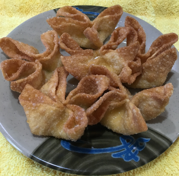Order 6 Piece Crab Rangoons food online from The Asian Cafe store, Murphys on bringmethat.com