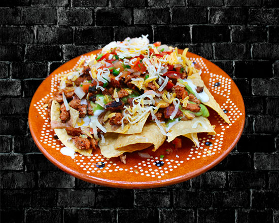 Order Pastor Nachos food online from Rivas Mexican Grill#4 store, Henderson on bringmethat.com