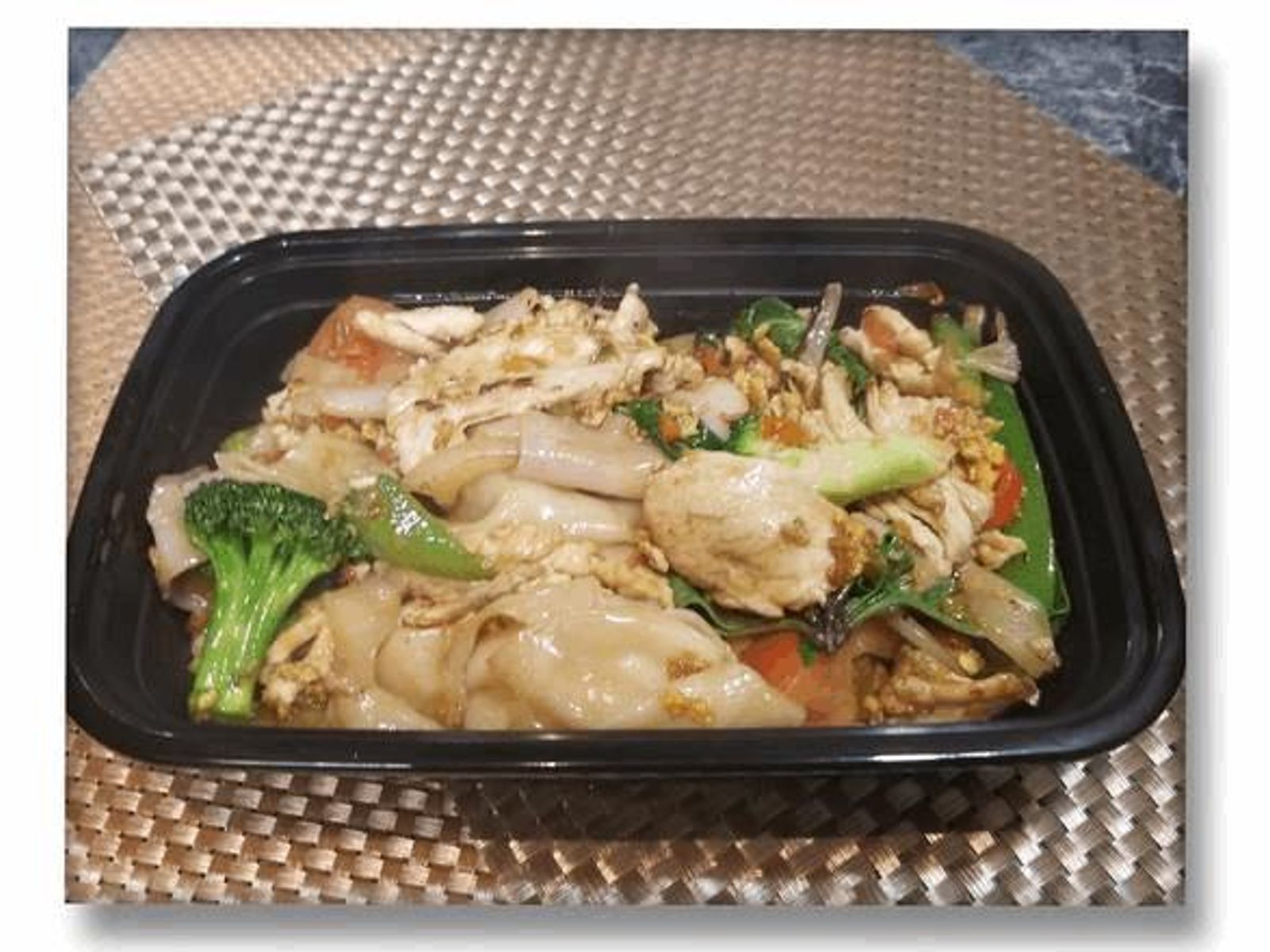 Order * Pud Kee Mao food online from Racha Thai store, Seattle on bringmethat.com