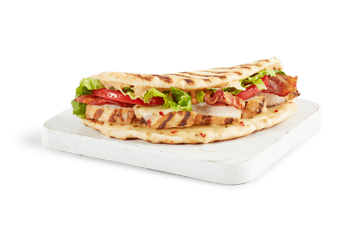 Order CHIPOTLE CHICKEN CLUB food online from Tropical Smoothie Cafe store, Blacksburg on bringmethat.com