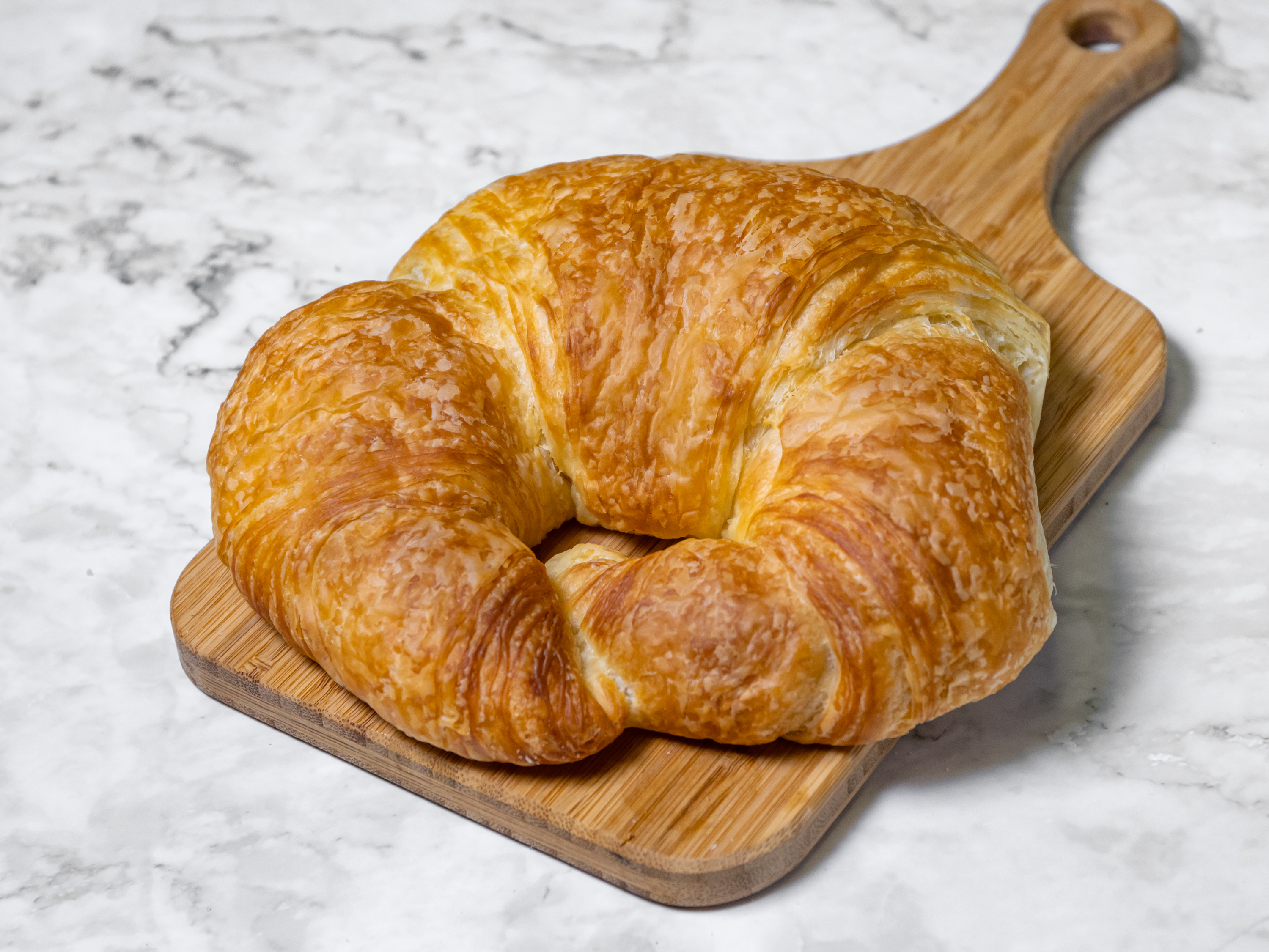 Order Plain Croissant food online from Master Donuts store, Fontana on bringmethat.com