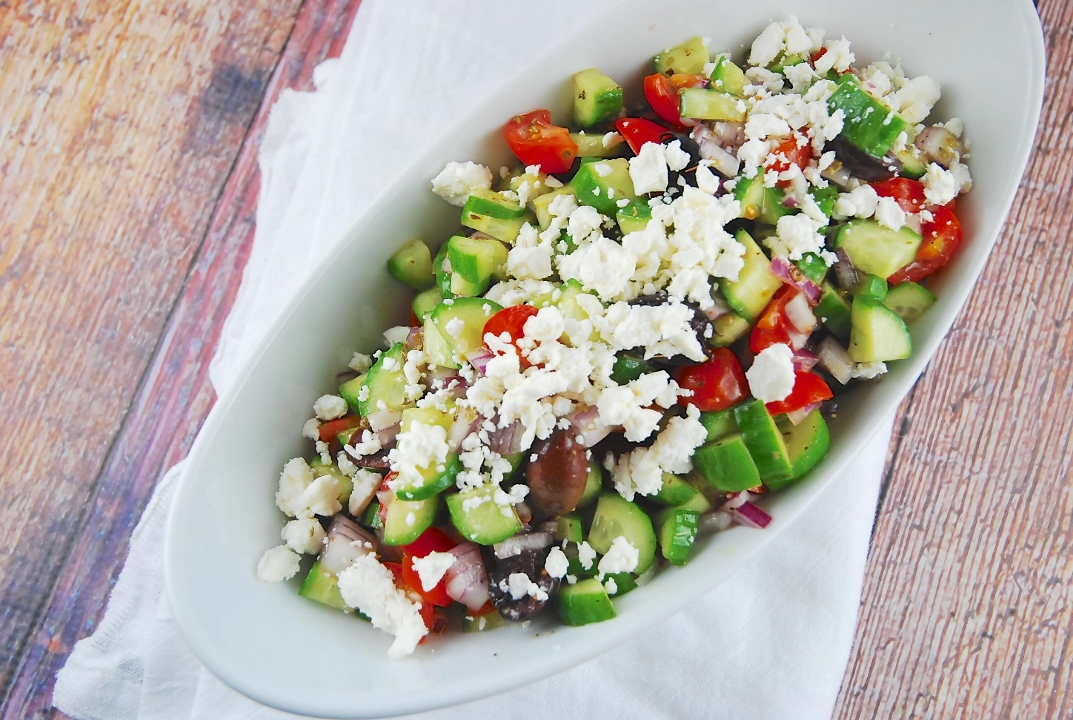 Order Greek Salad (GF, VG) food online from Afro Deli store, Saint Paul on bringmethat.com