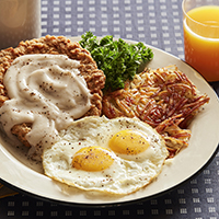 Order Chicken Fried Steak with 2 Ranch Eggs food online from Hof Hut store, Long Beach on bringmethat.com