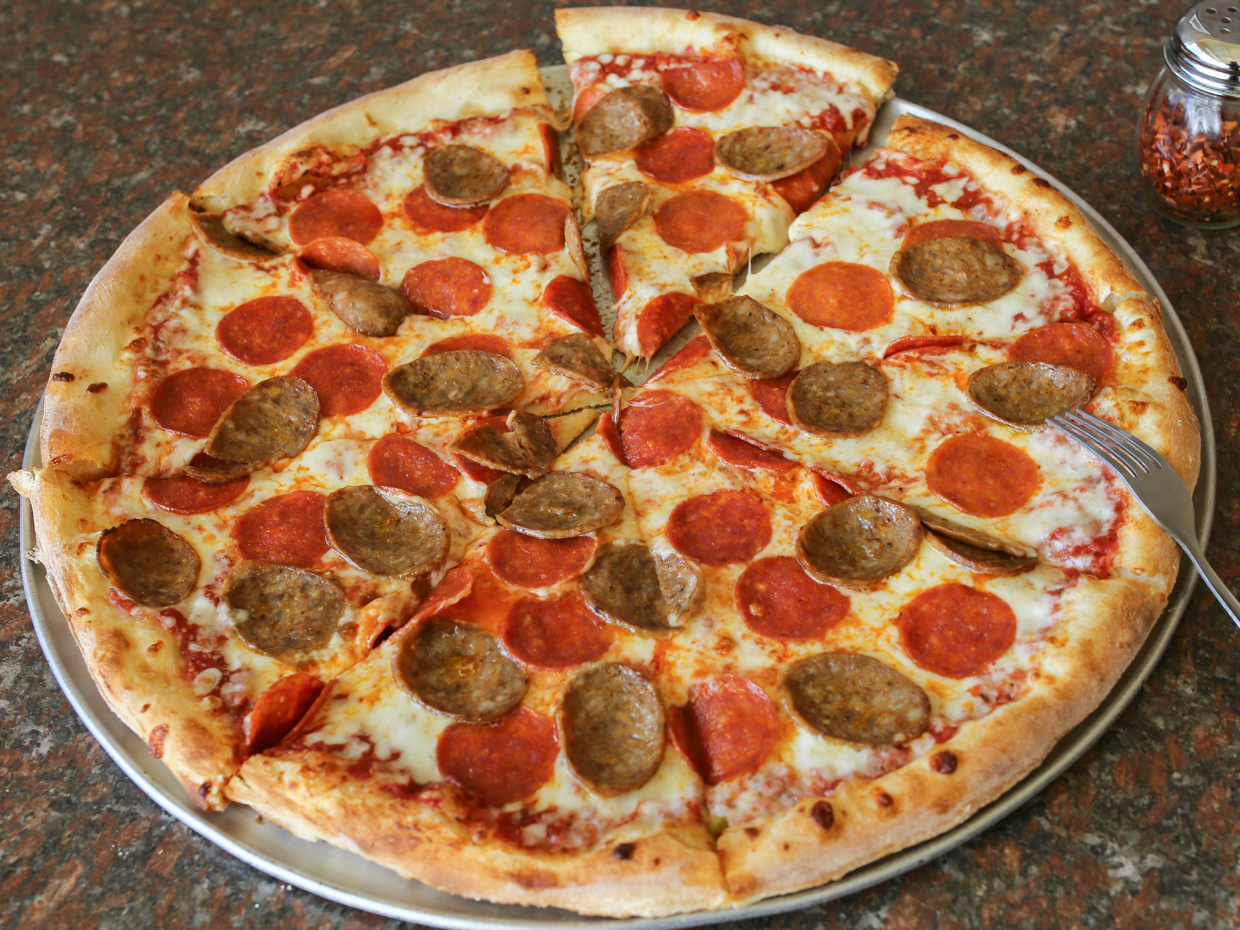 Order 2-Topping Pizza food online from Abo's Pizza store, Denver on bringmethat.com