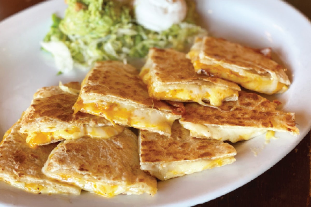 Order 3 Cheese Quesadilla food online from Uncle Julio's store, Brentwood on bringmethat.com