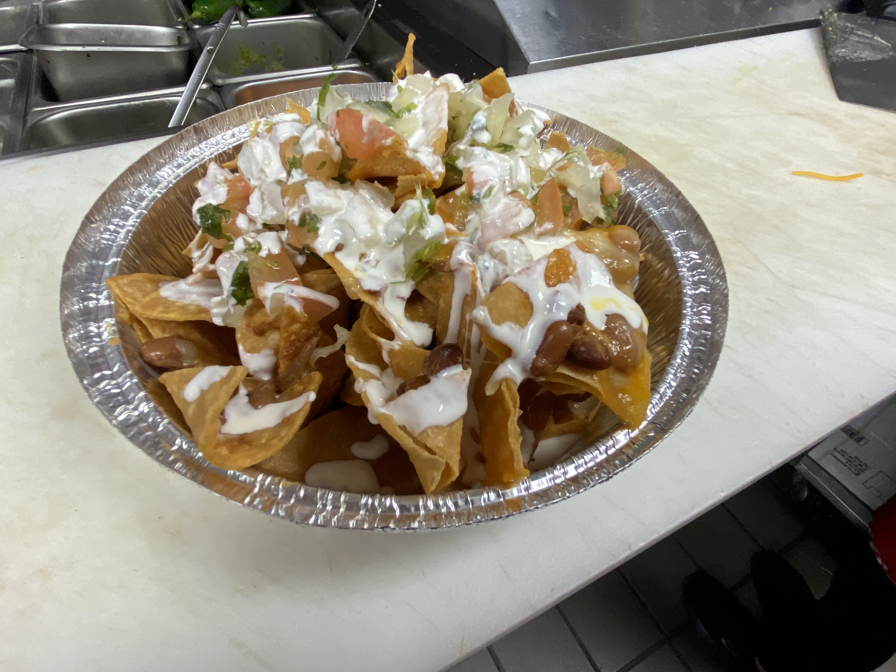 Order Nachos Pollo food online from Sabores Latinos Restaurant & Bakery Corp. store, Richmond Hill on bringmethat.com
