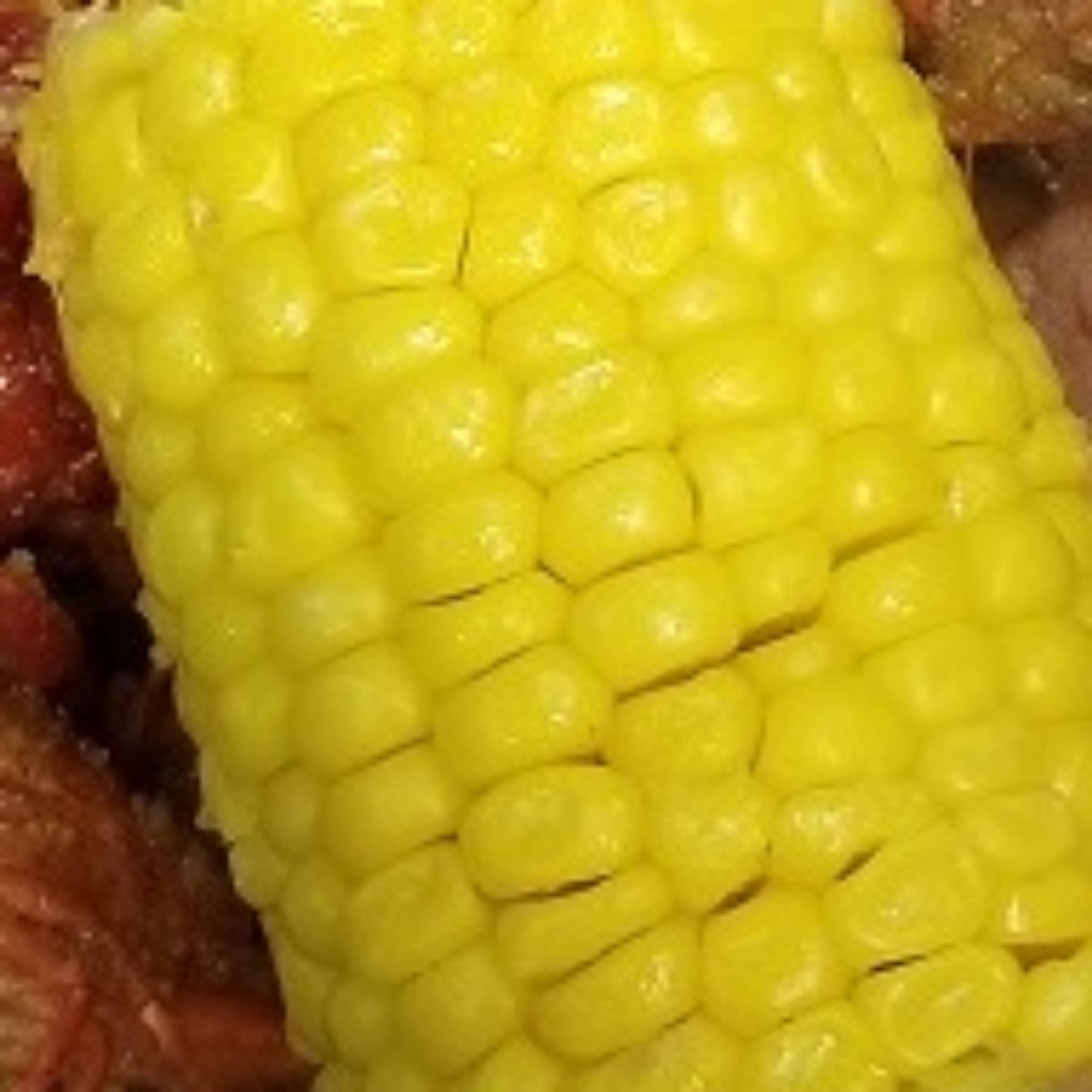 Order Corn food online from Em Kajun Asian Cuisine store, Haltom City on bringmethat.com