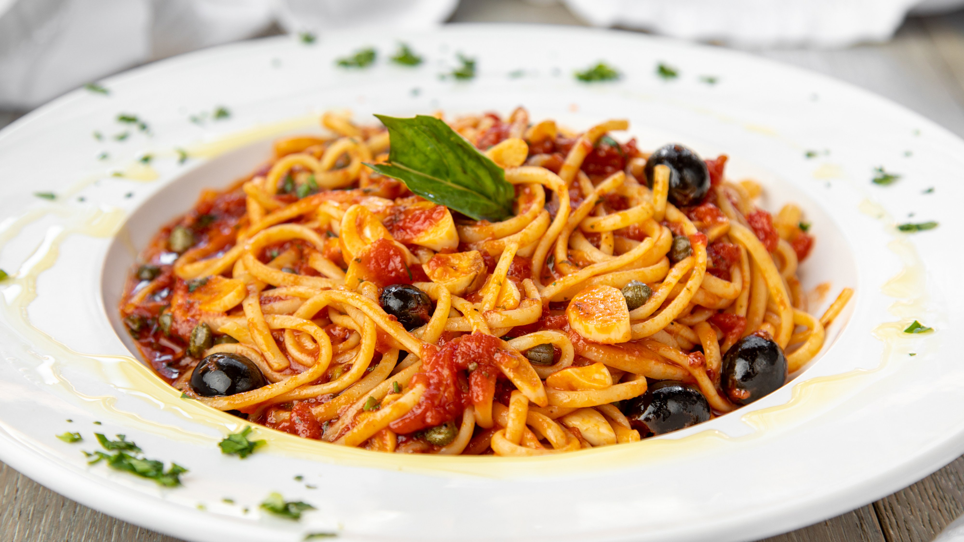 Order Linguine Puttanesca food online from Italian Brothers Restaurant store, Los Gatos on bringmethat.com
