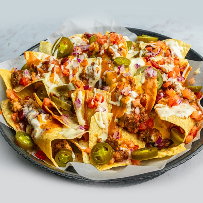 Order Nachos food online from Hurricane Grill & Wings store, Syosset on bringmethat.com