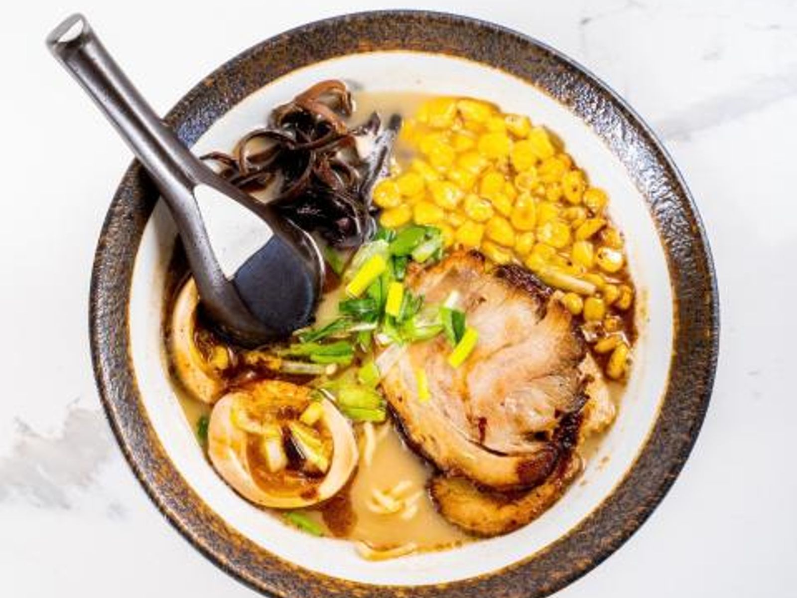 Order Tonkotsu Black food online from Takumi Hibachi Sushi & Lounge store, Bay Shore on bringmethat.com