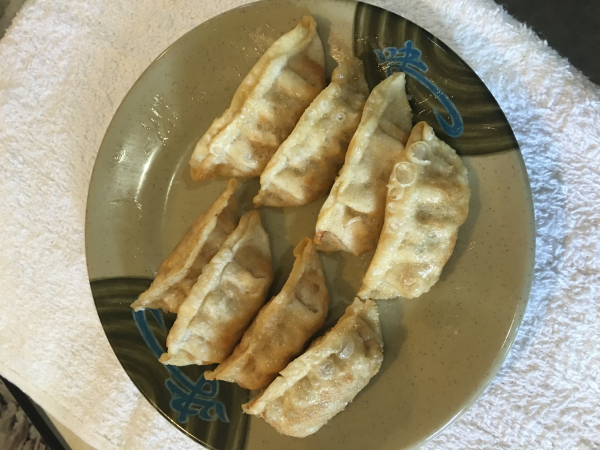 Order 8 Piece Pot Stickers food online from The Asian Cafe store, Murphys on bringmethat.com