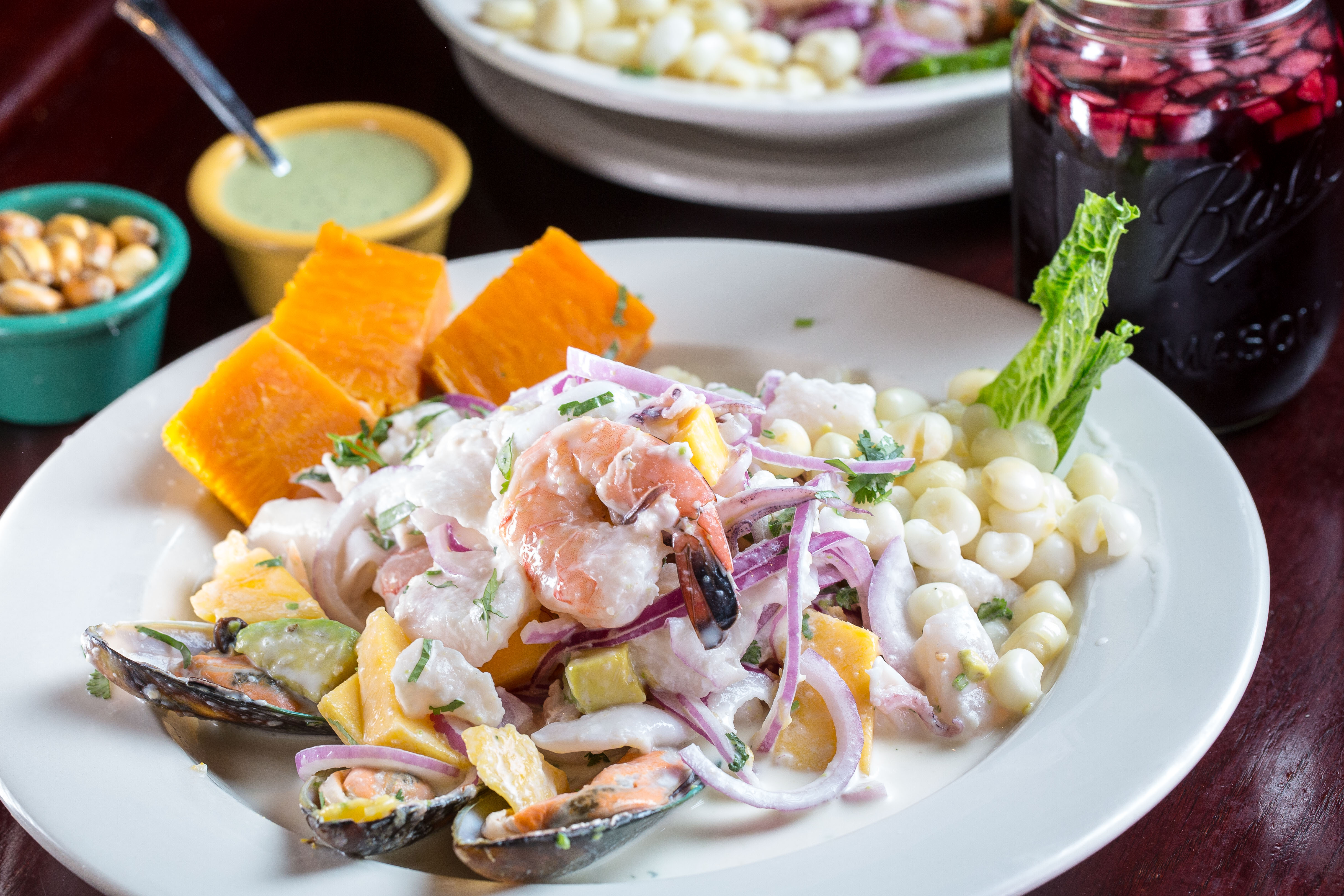 Order Ceviche Mixto de Mango food online from Riko Peruvian Cuisine store, Queens on bringmethat.com
