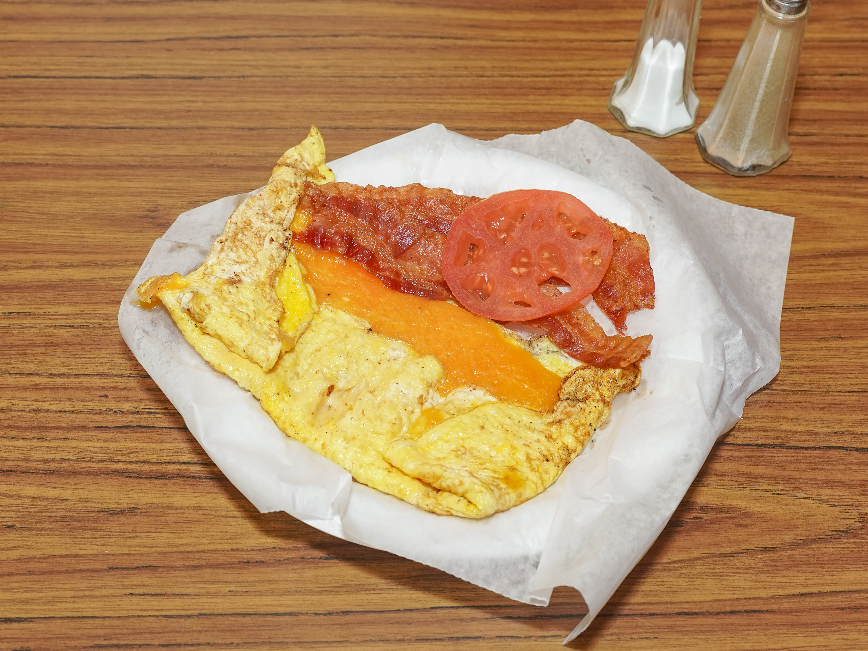 Order Bacon Omelette food online from C & C Eatery store, Jacksonville on bringmethat.com