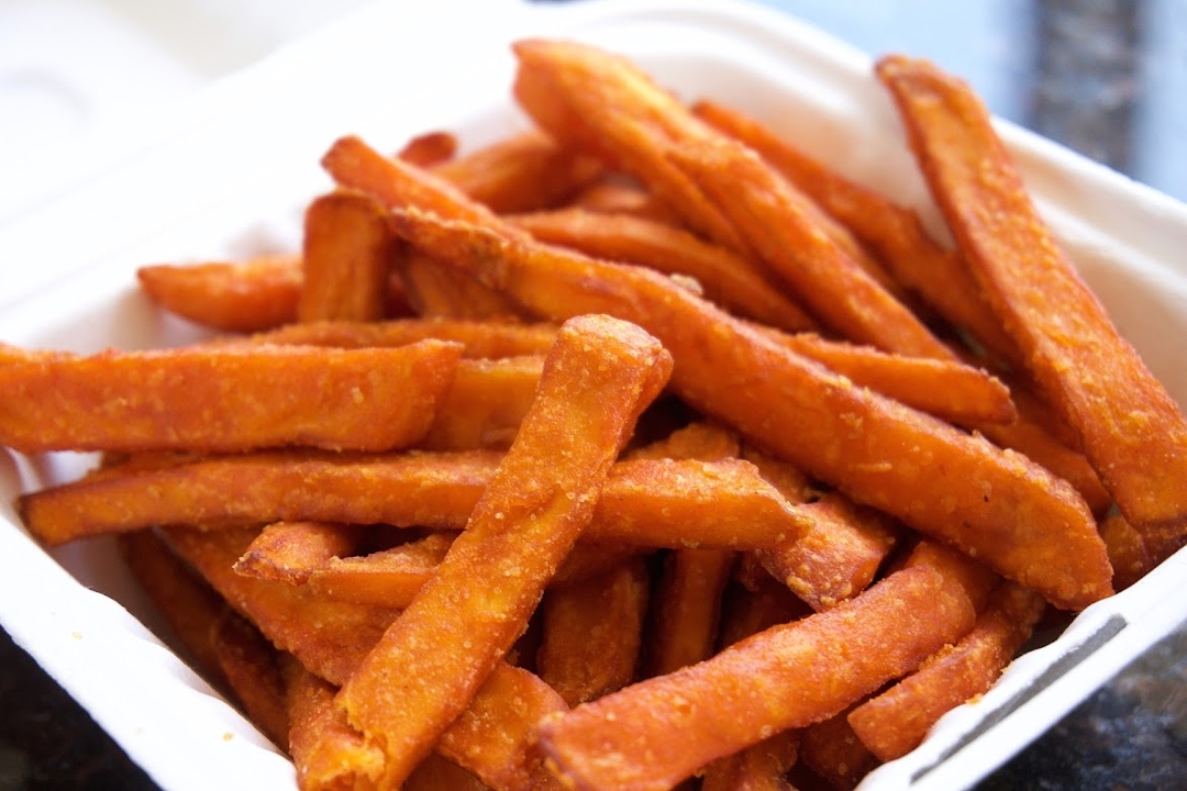 Order Sweet Potato Fries (GF) food online from Afro Deli store, Saint Paul on bringmethat.com