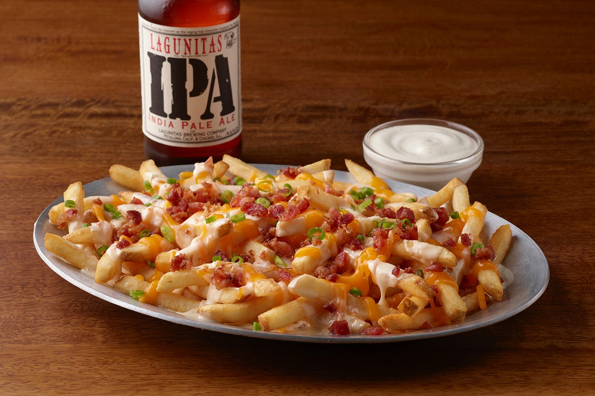 Order Loaded Cheese Fries food online from Ruby Tuesday store, Thomasville on bringmethat.com