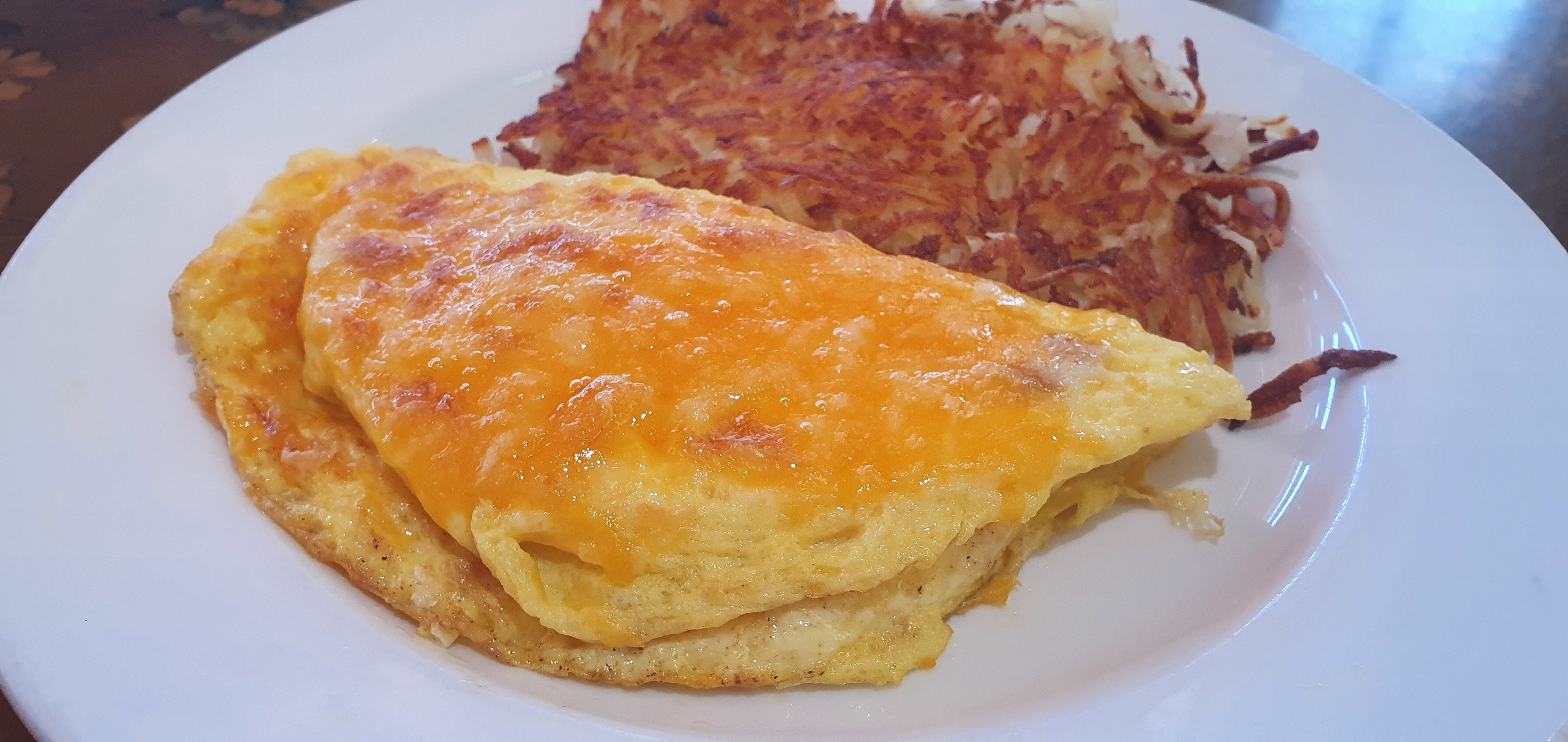 Order Traditional Cheese Omelet food online from Kountry Folks Homestyle Restaurant store, Riverside on bringmethat.com