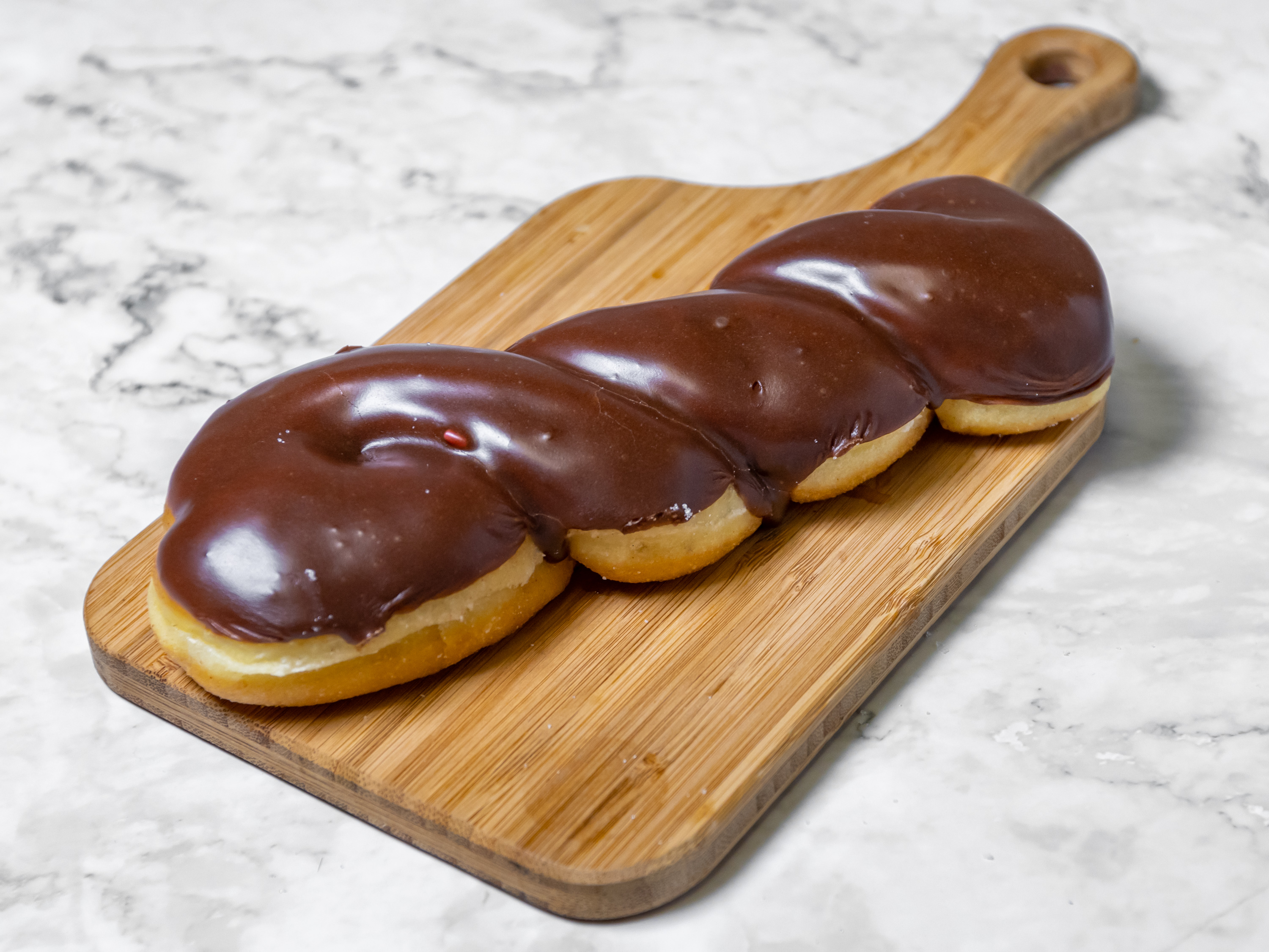 Order Chocolate Twist Donut food online from Master Donuts store, Fontana on bringmethat.com